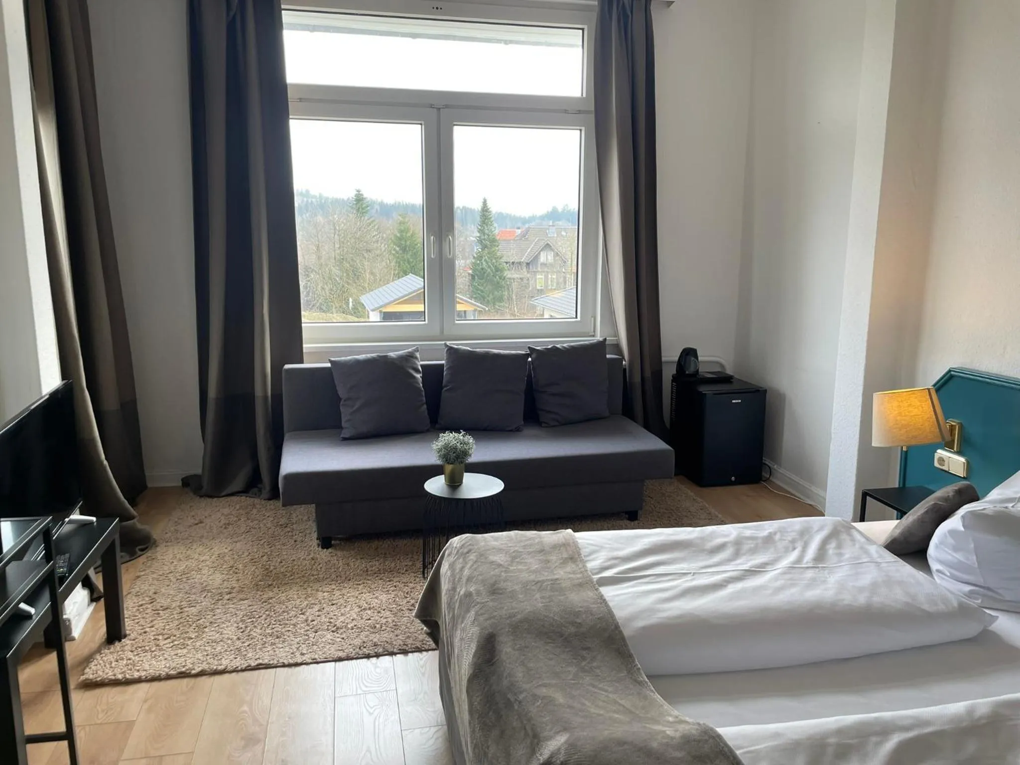 Photo of the whole room, Bed in Berghotel HARZ