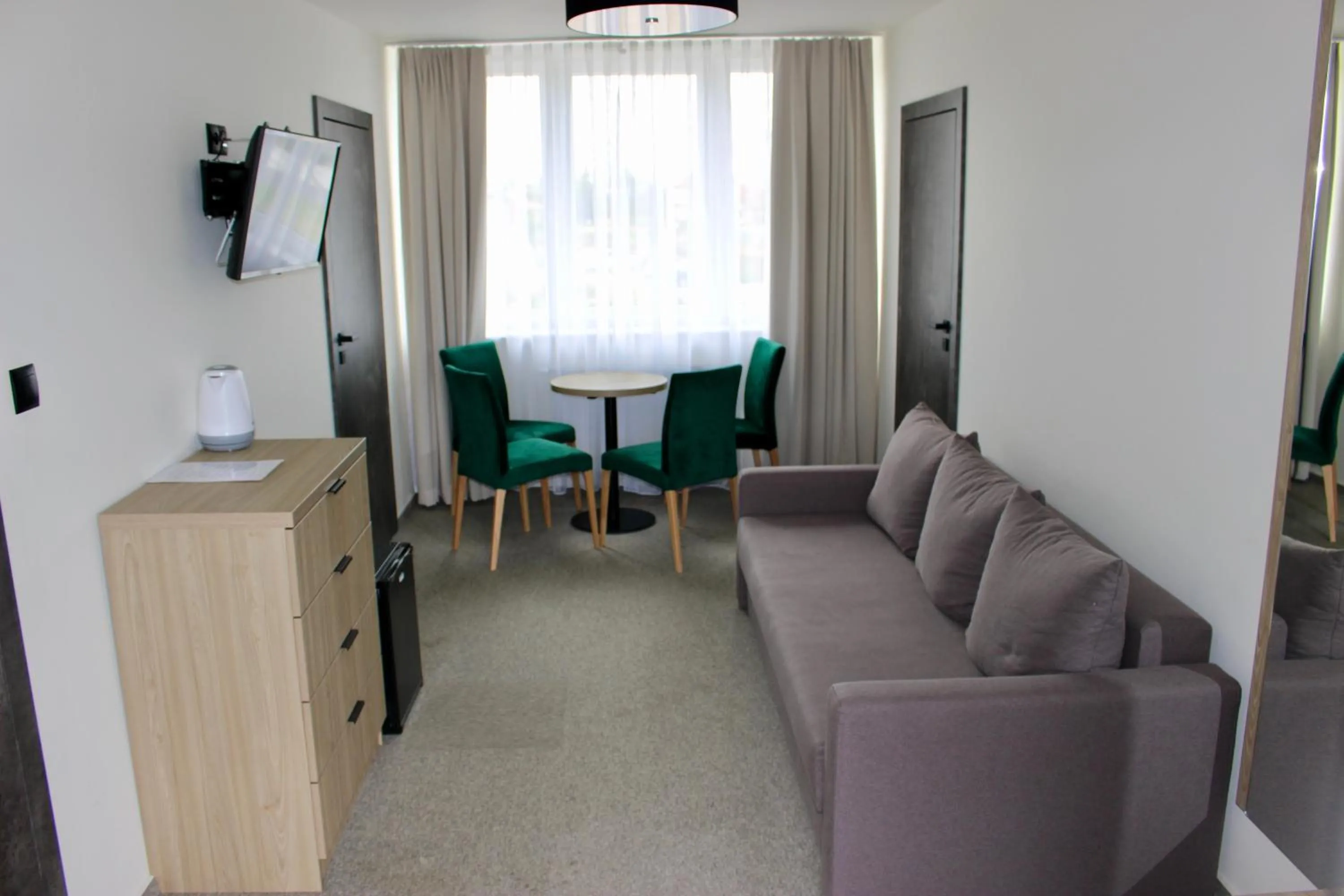 Communal lounge/ TV room in Nadmorskie Klimaty