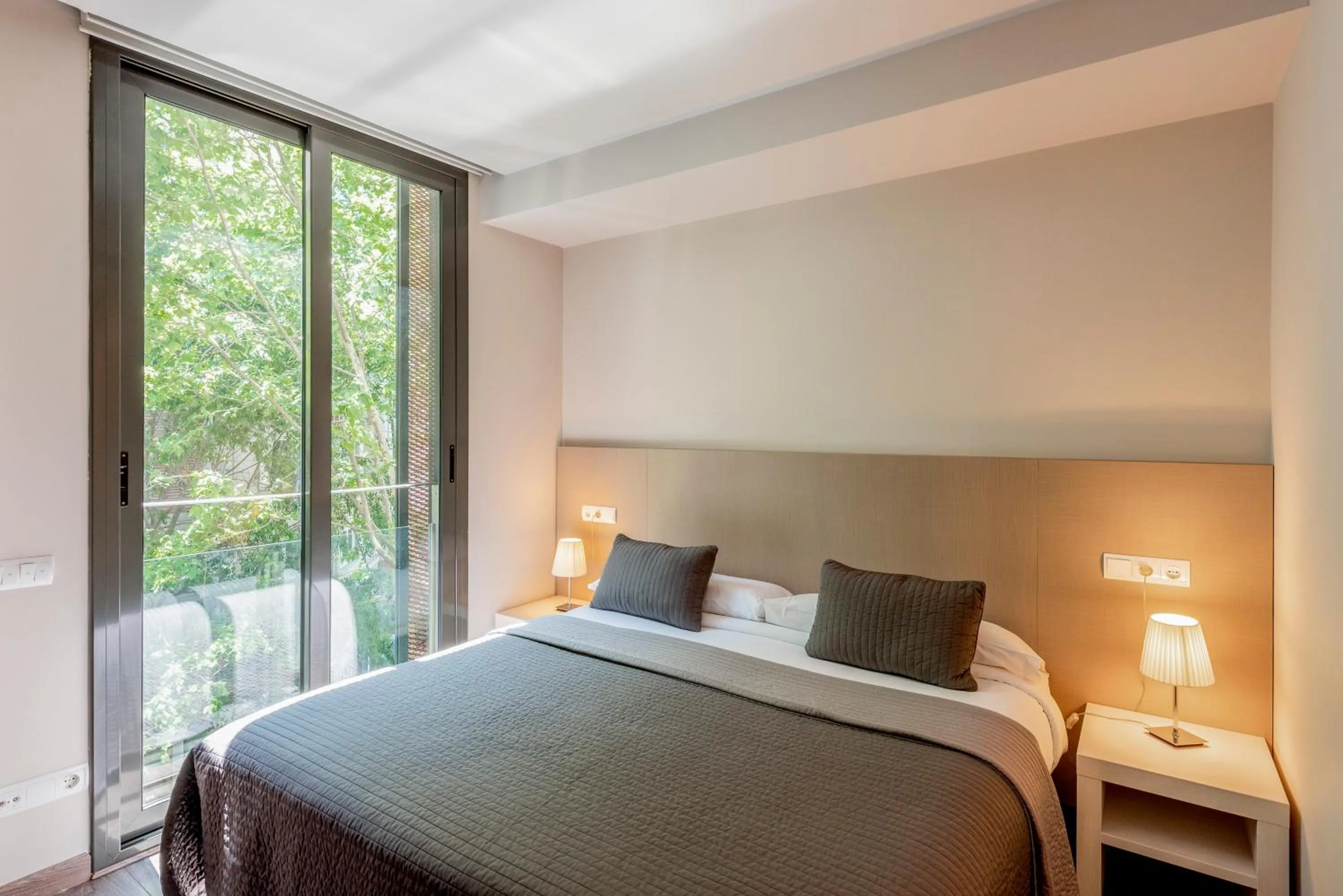 Bed in Espais Blaus Apartments