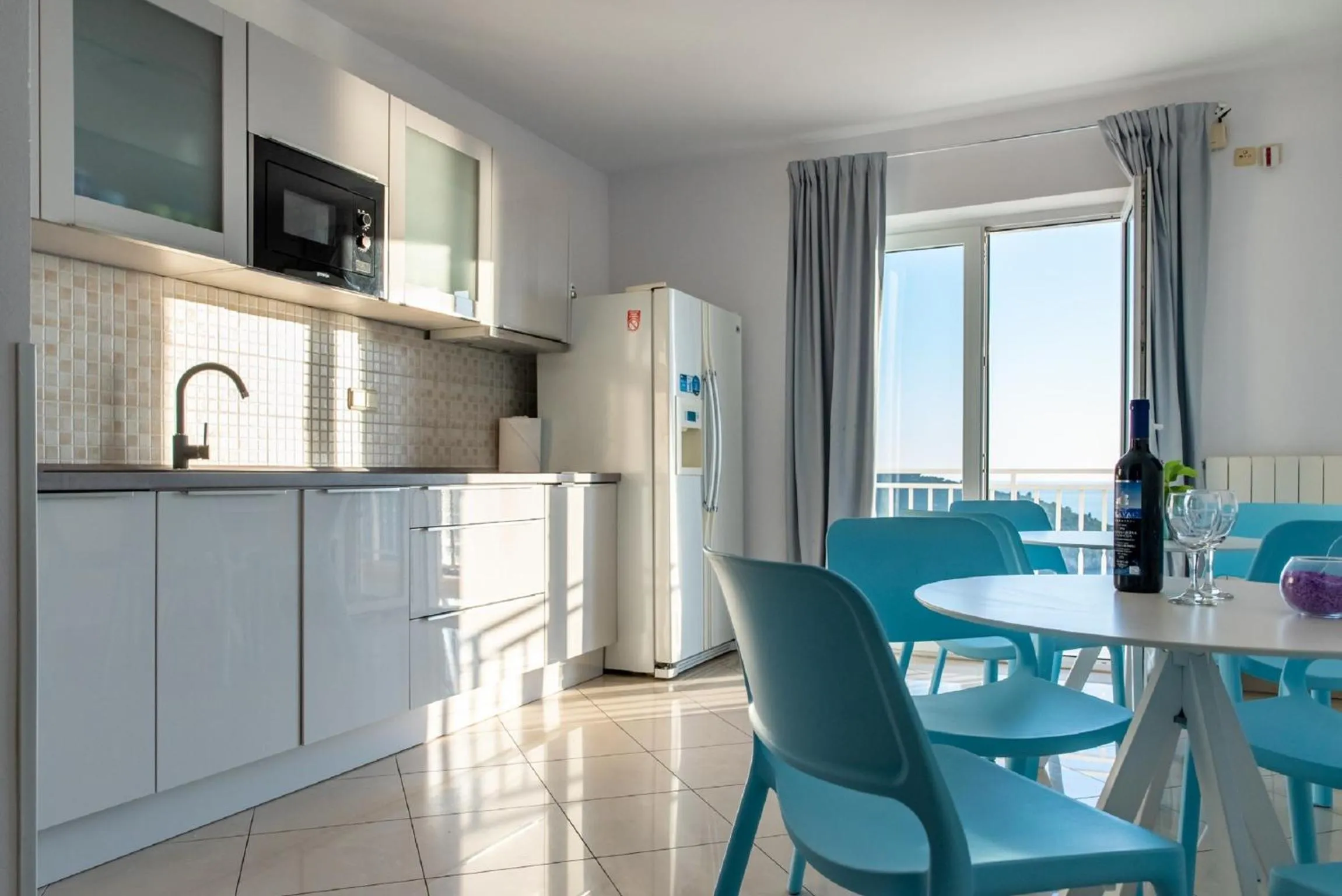 Kitchen or kitchenette in Rooms Raič