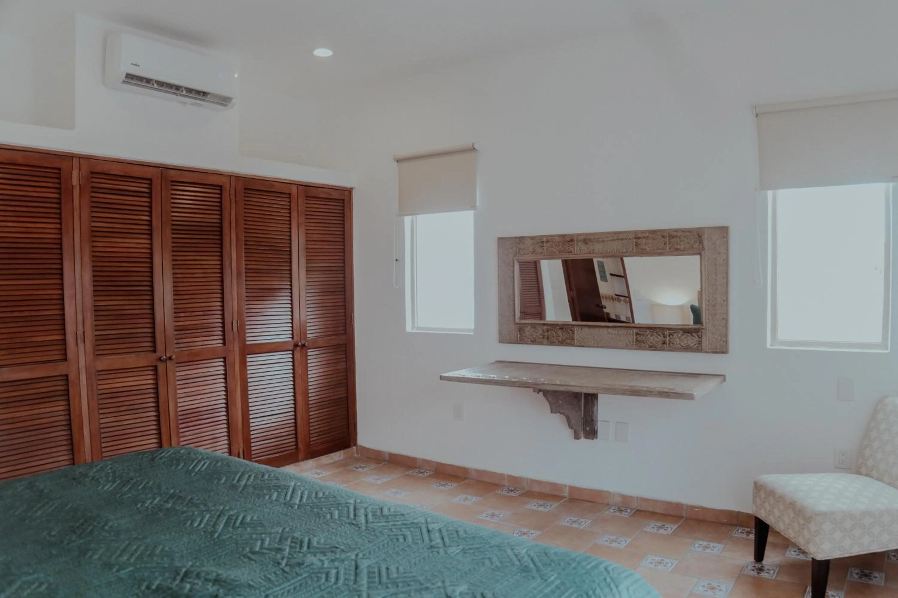 Bed in Fabiola Condo Hotel