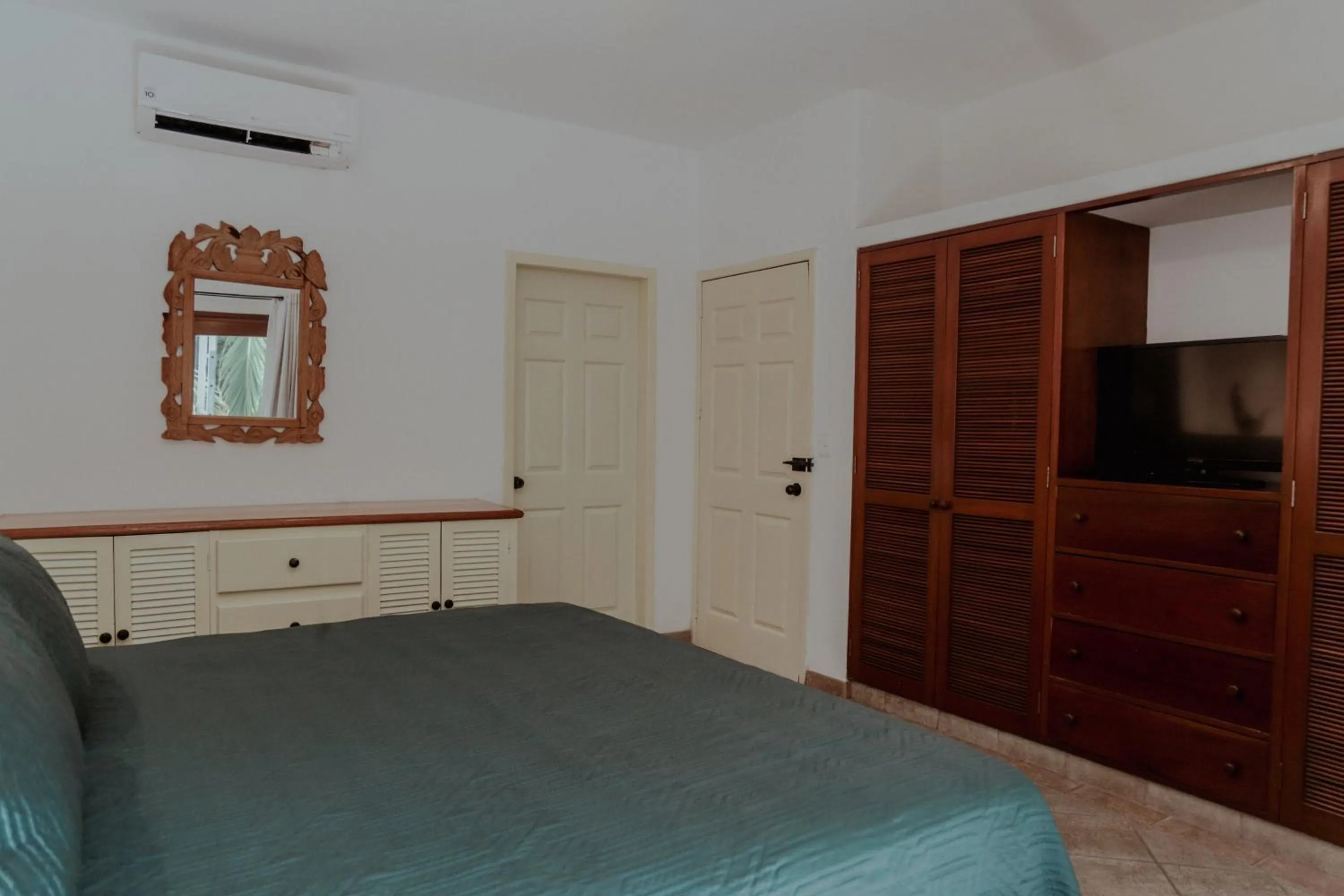 Bed in Fabiola Condo Hotel