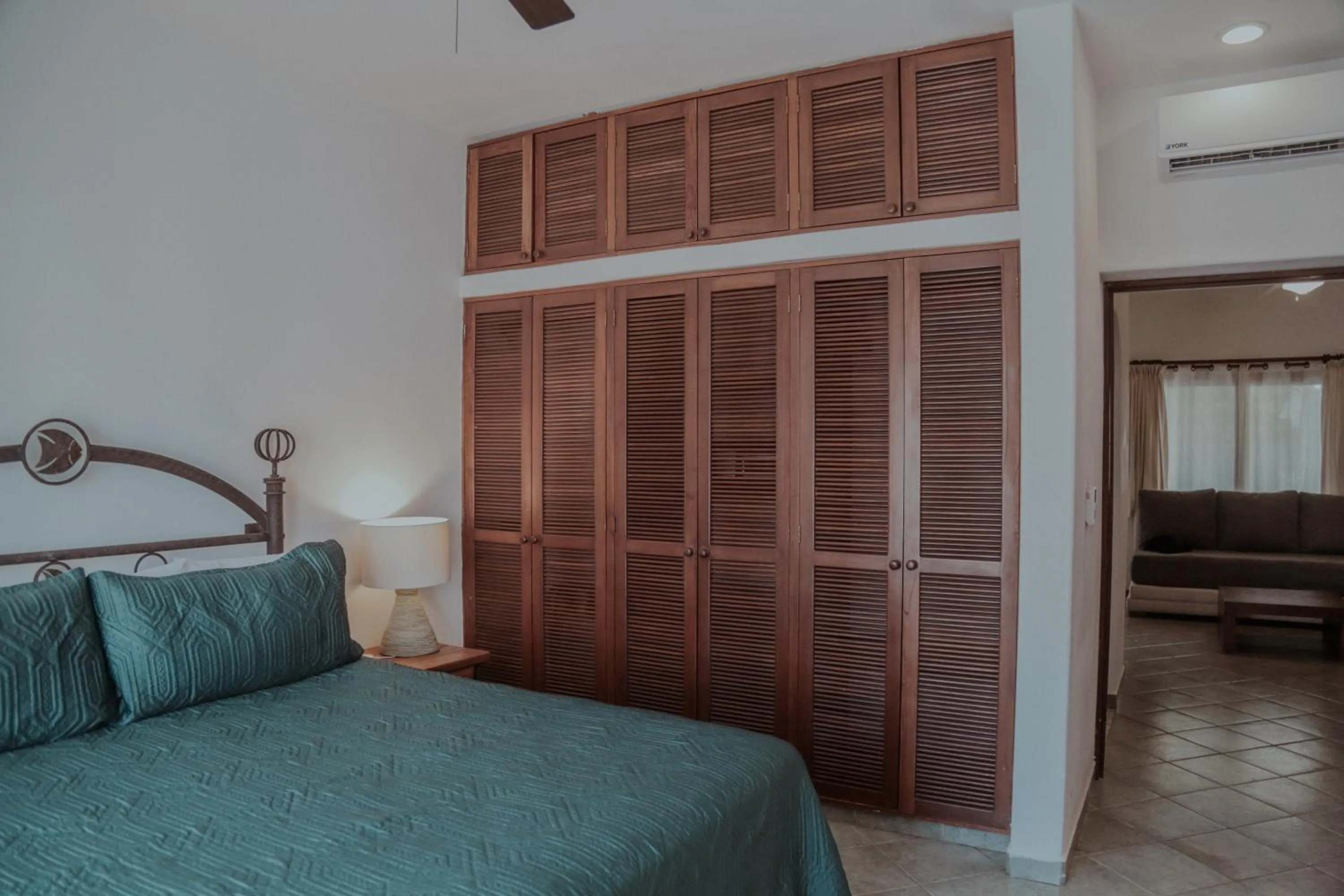 Bed in Fabiola Condo Hotel