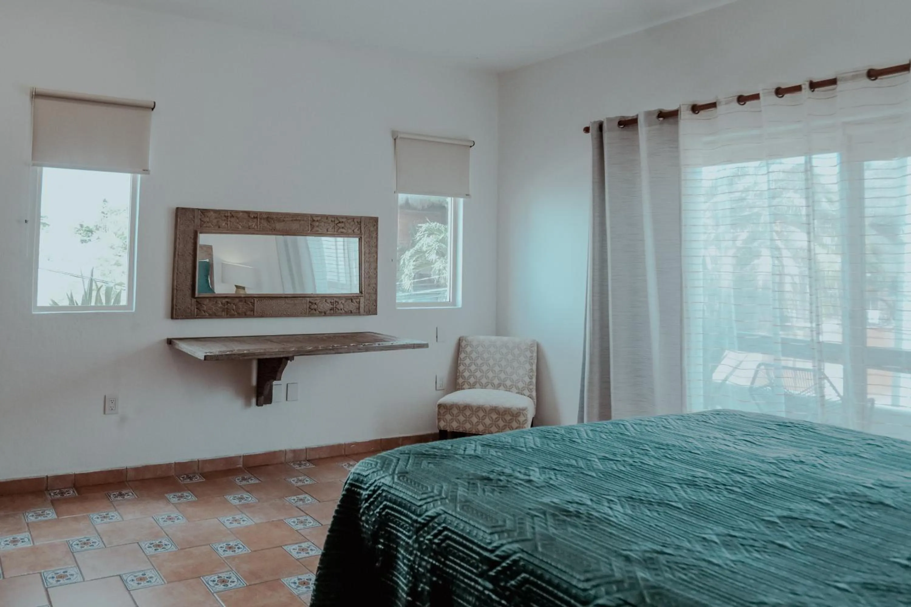 Bed in Fabiola Condo Hotel