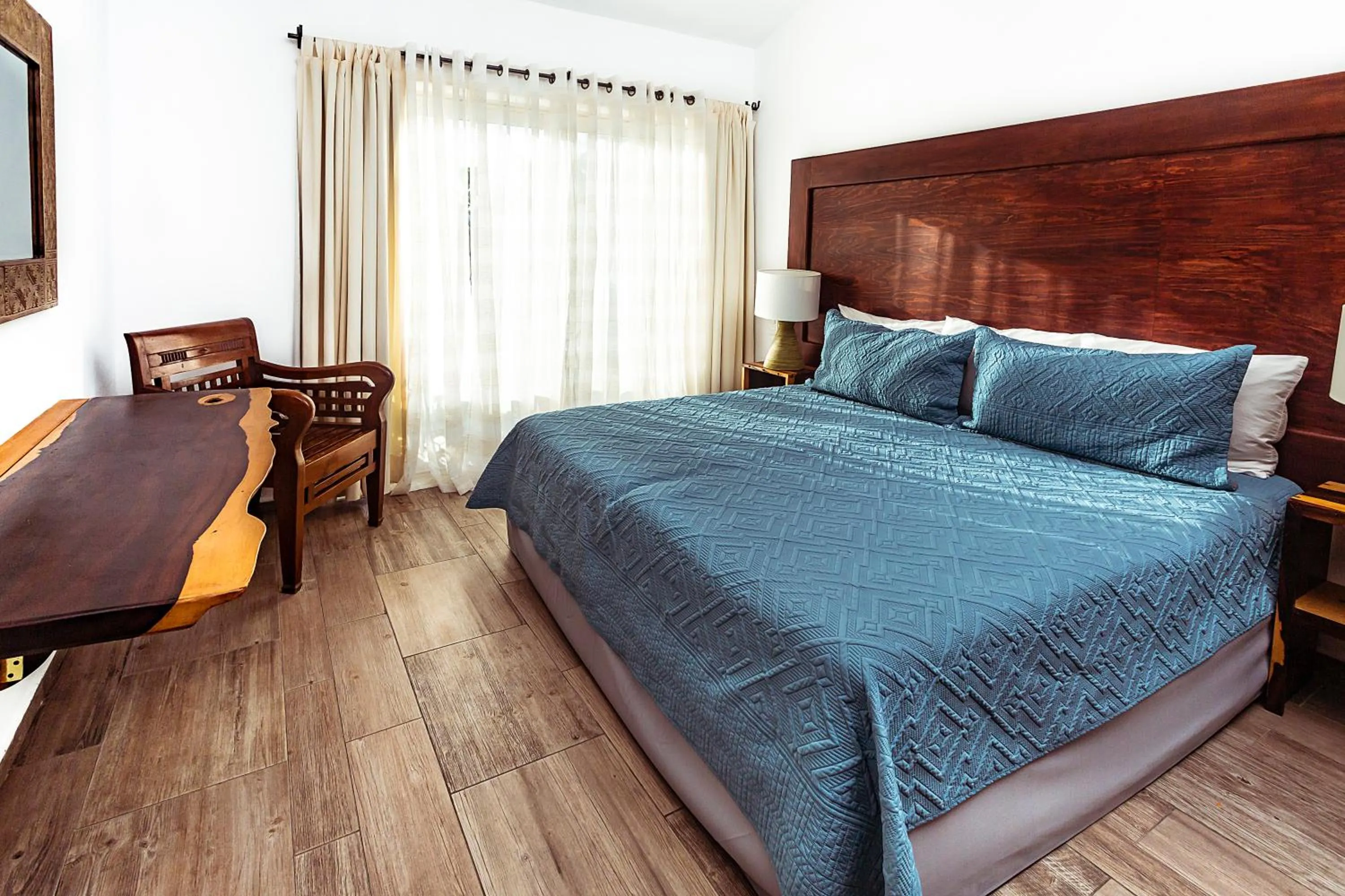 Bed in Fabiola Condo Hotel