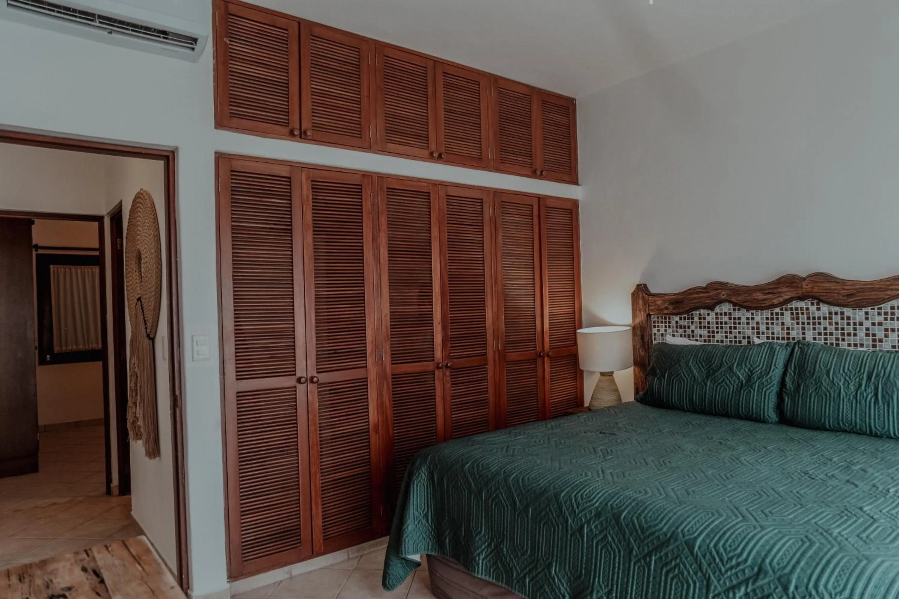 Bed in Fabiola Condo Hotel