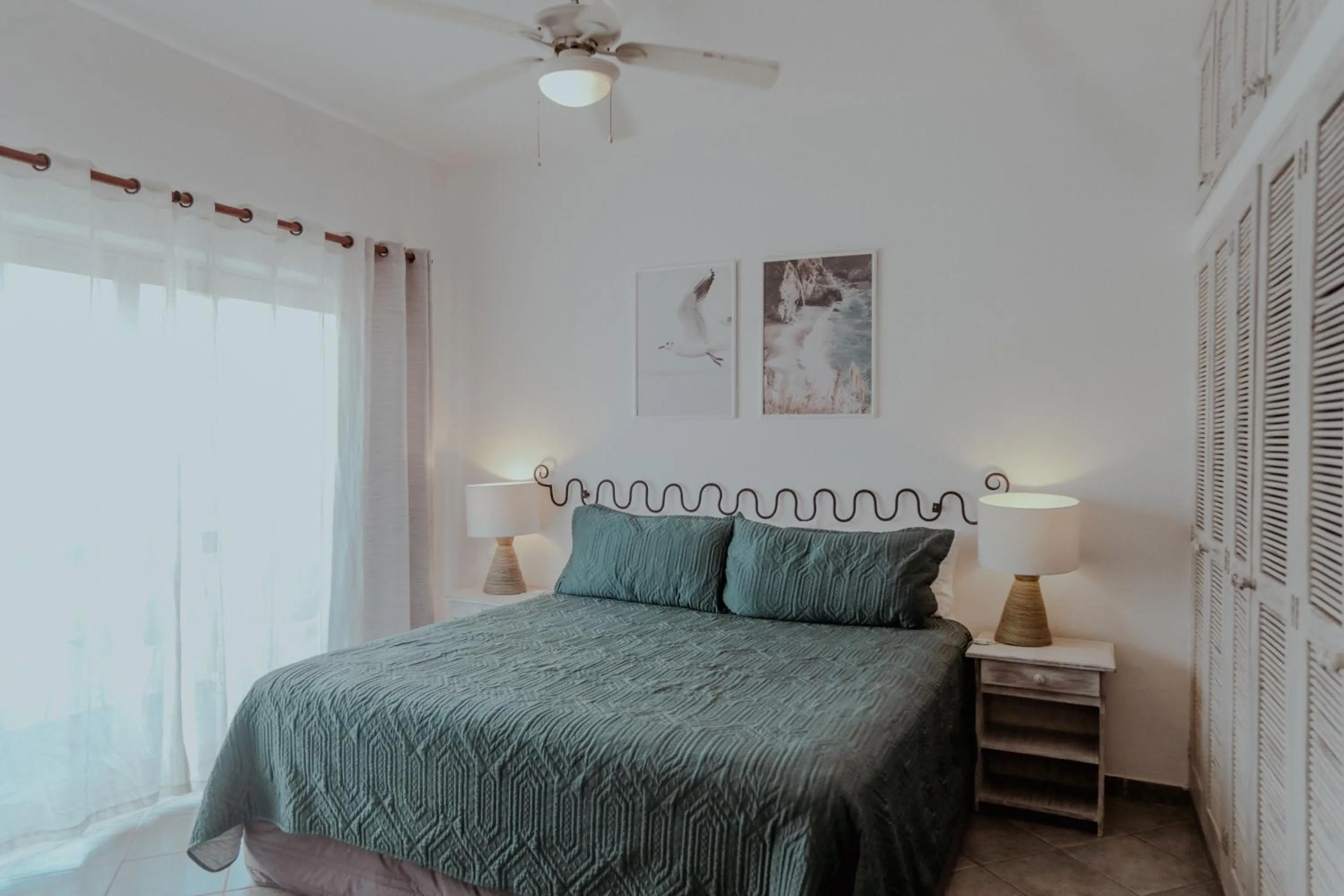 Bed in Fabiola Condo Hotel