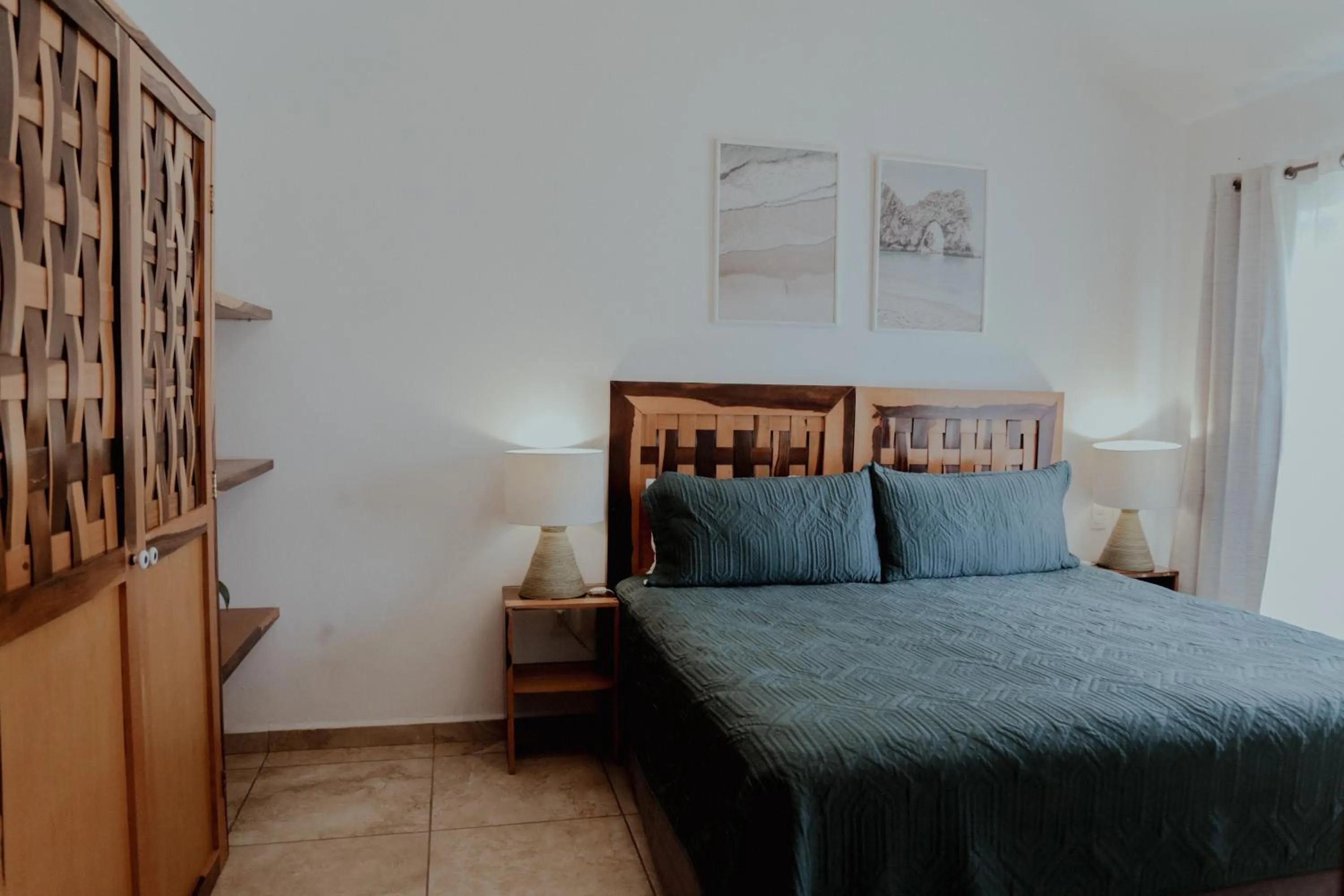 Bed in Fabiola Condo Hotel