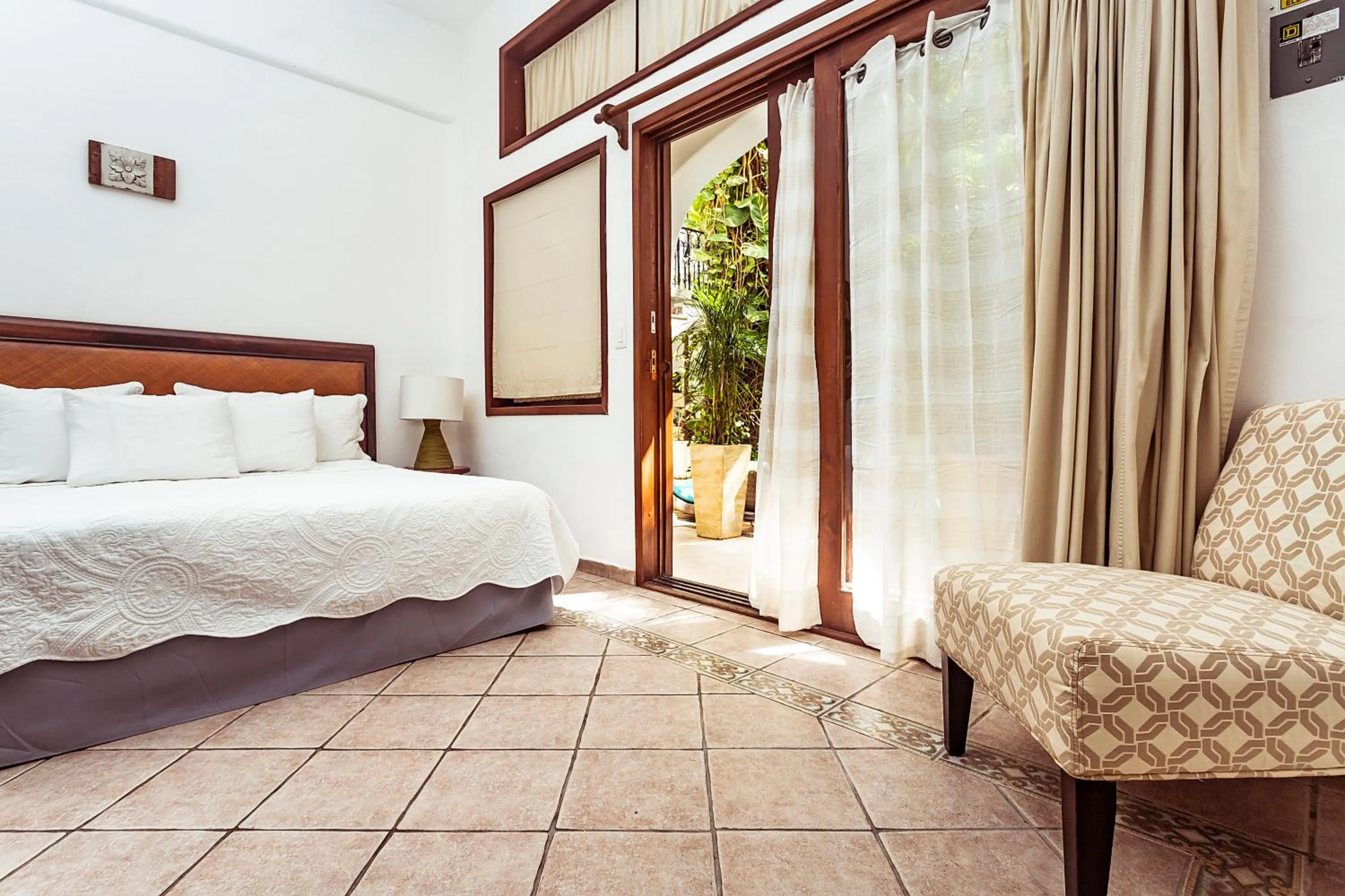 Bed in Fabiola Condo Hotel