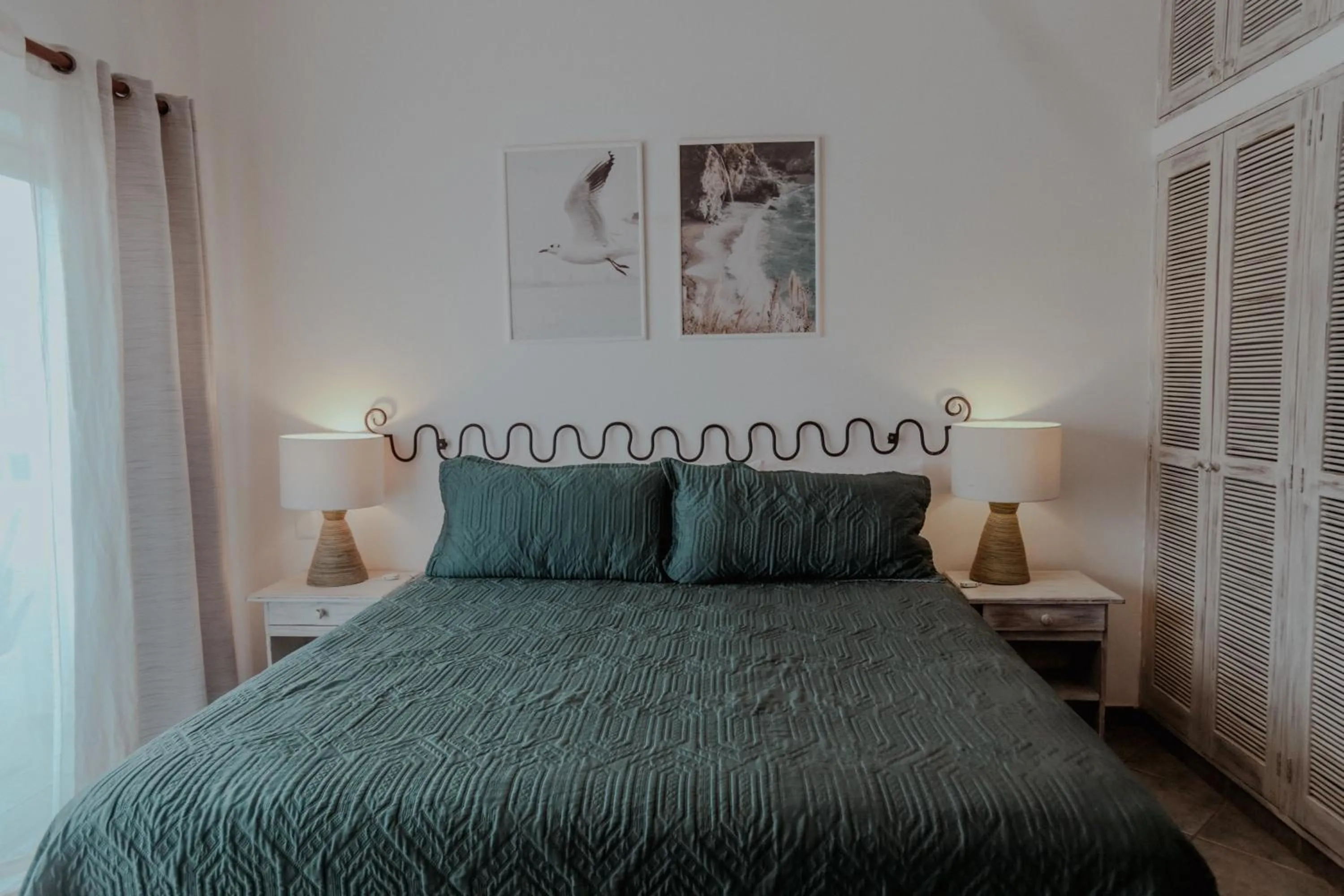 Bed in Fabiola Condo Hotel