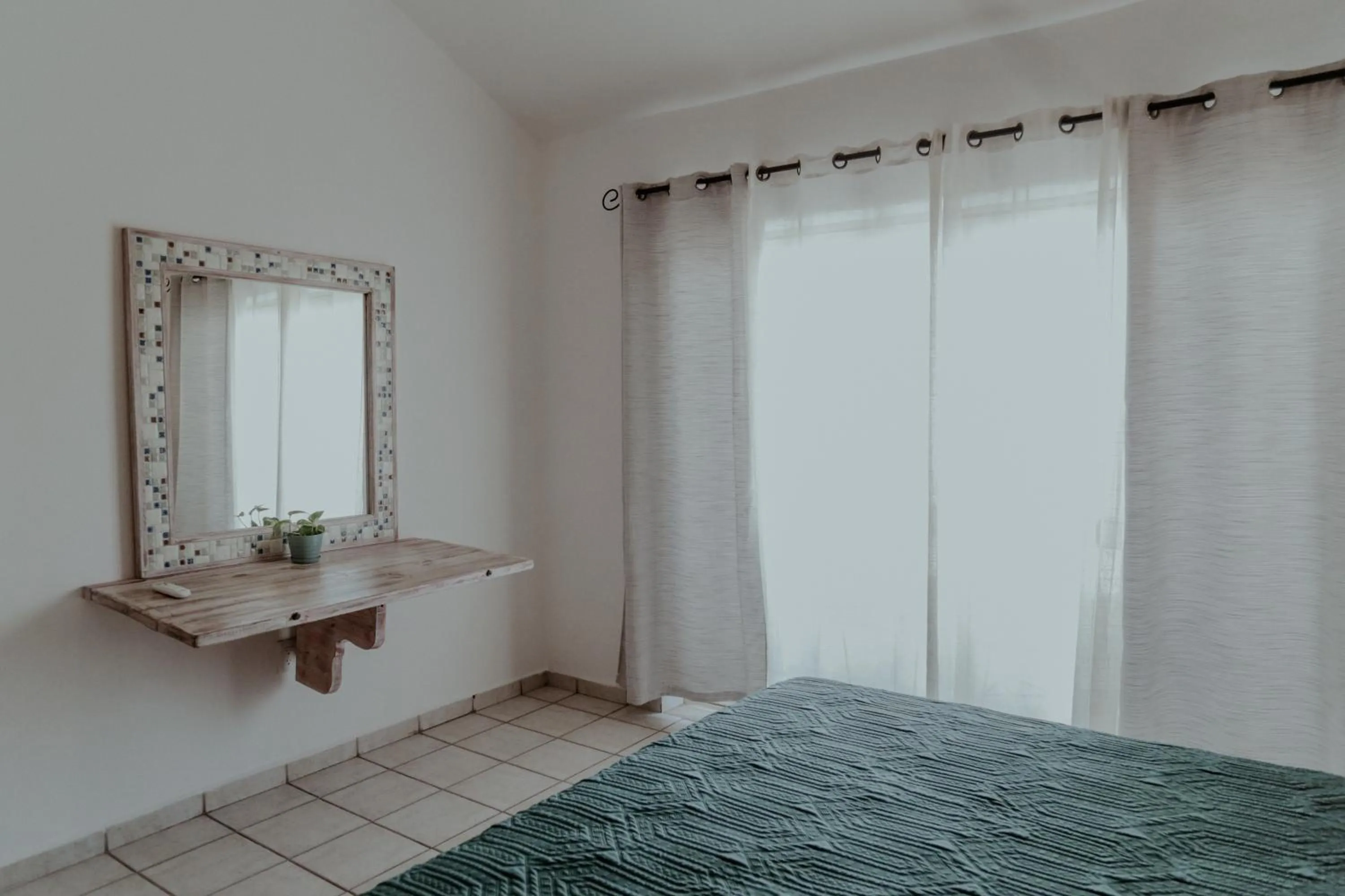 Bed in Fabiola Condo Hotel