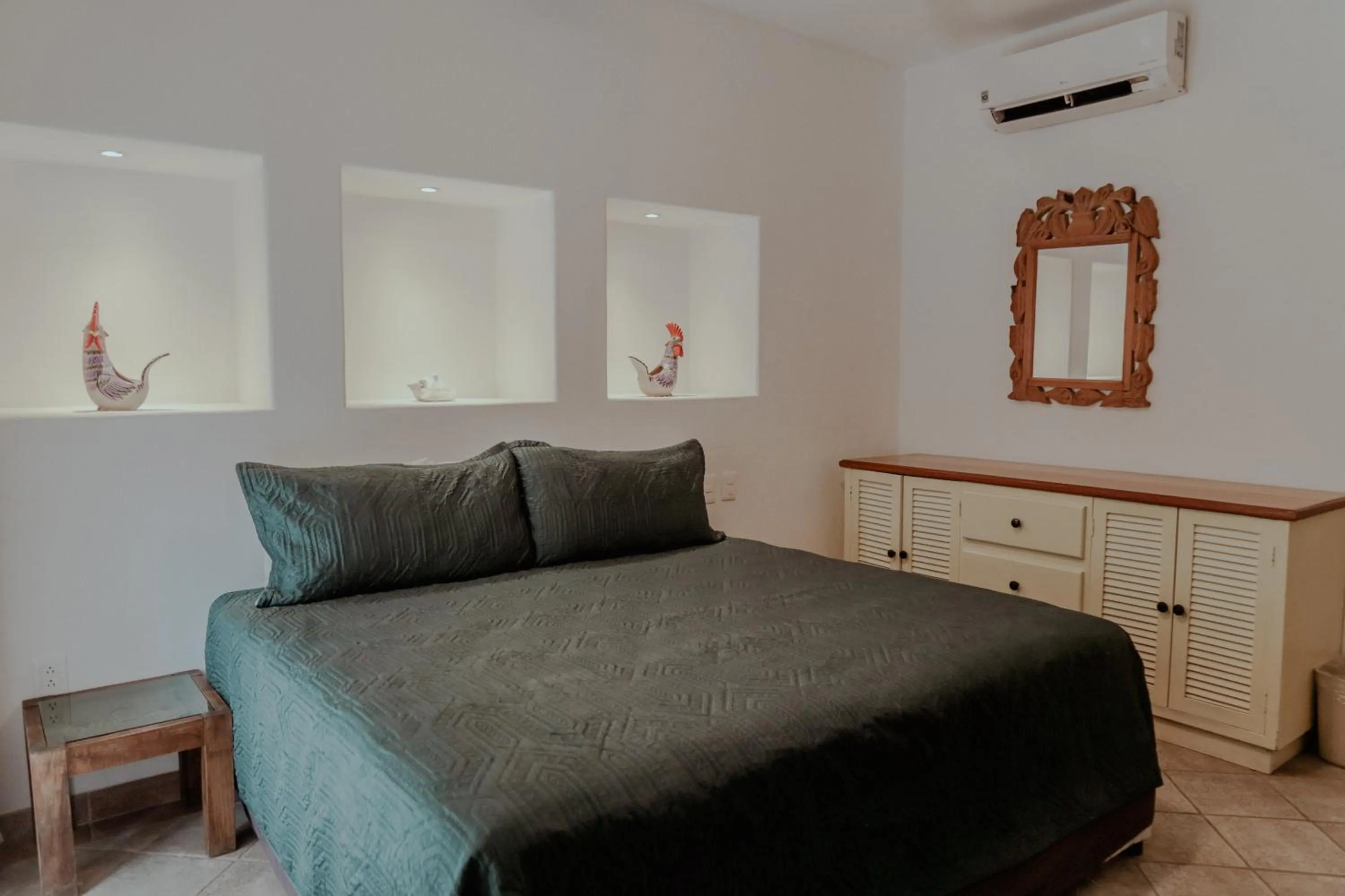 Bed in Fabiola Condo Hotel