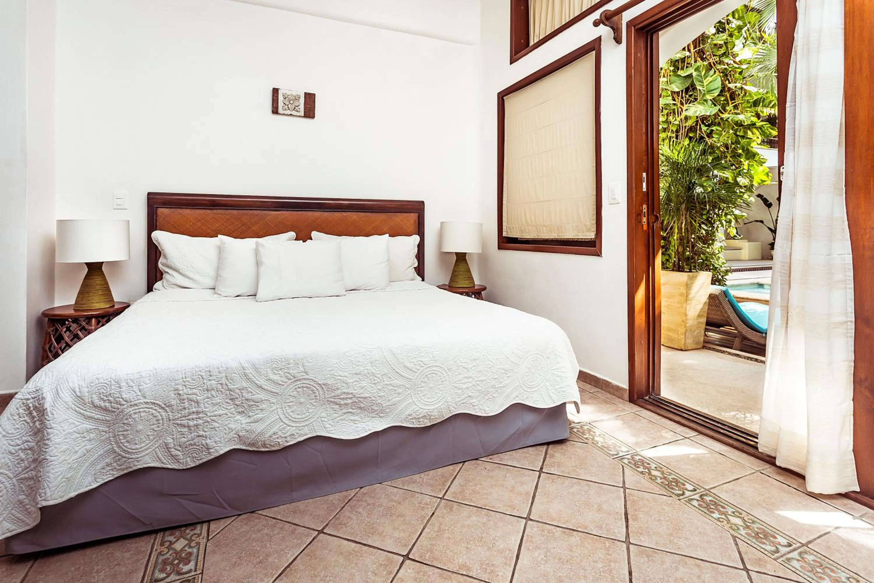 Bed in Fabiola Condo Hotel