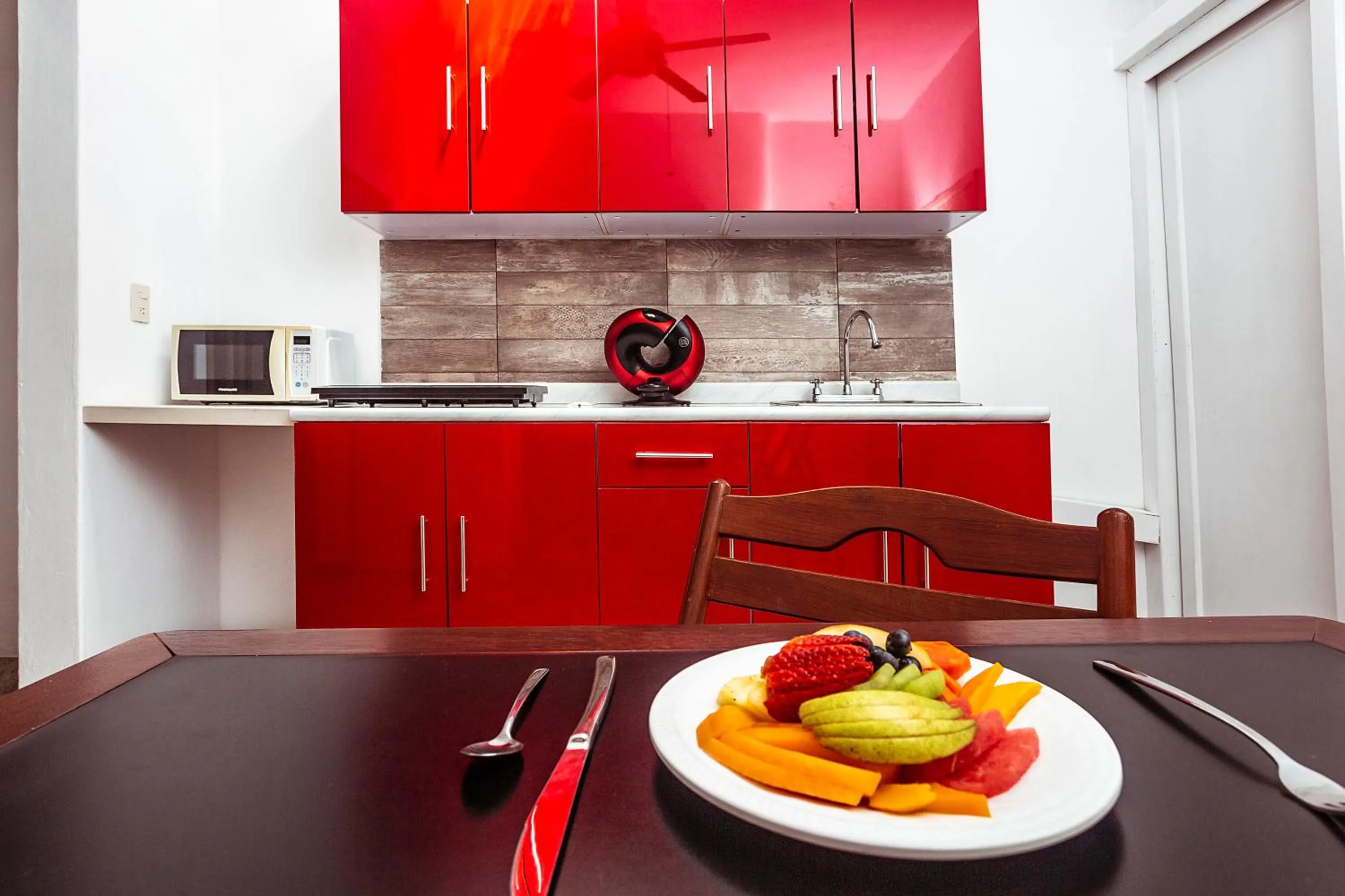 Kitchen or kitchenette in Fabiola Condo Hotel