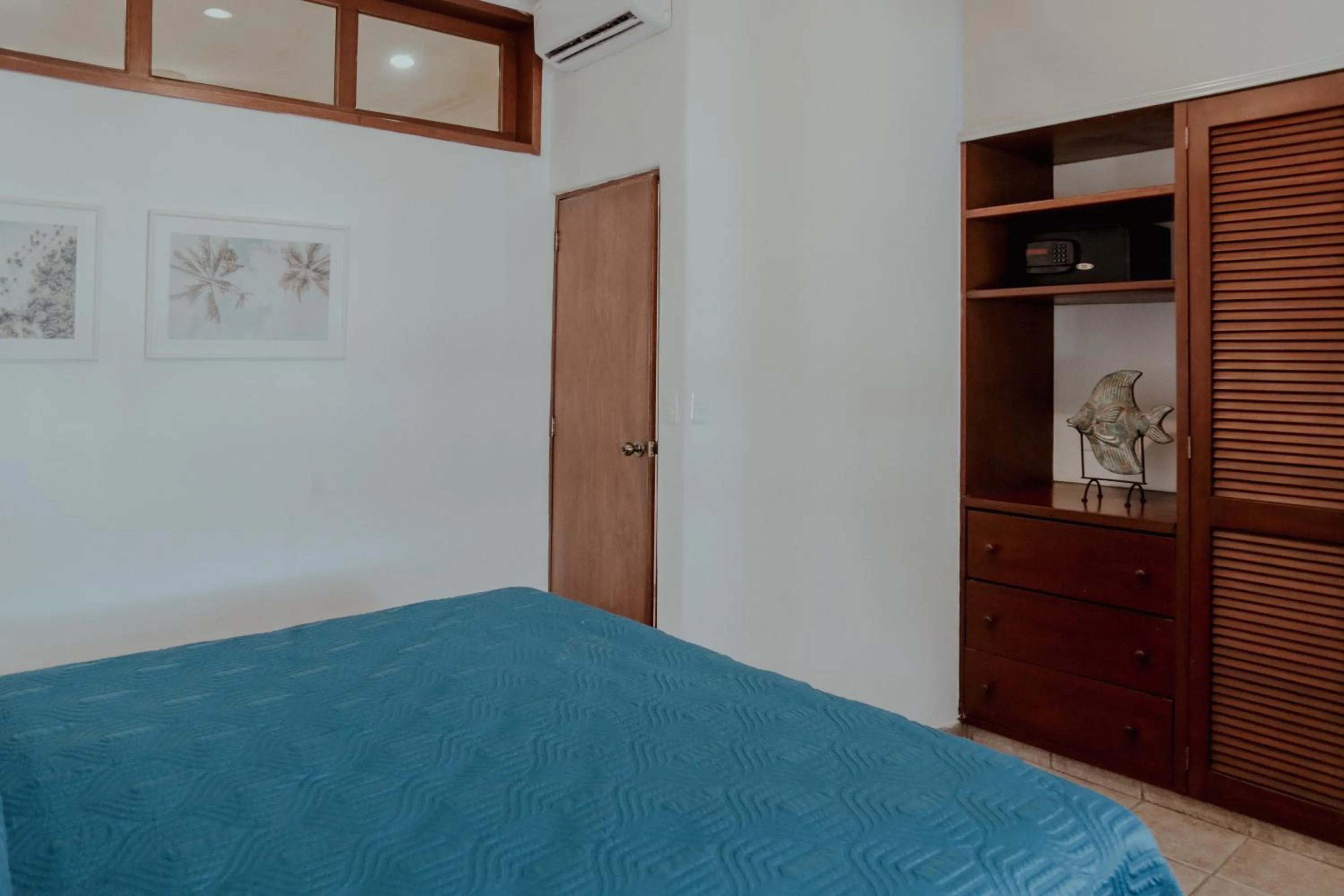 Bed in Fabiola Condo Hotel