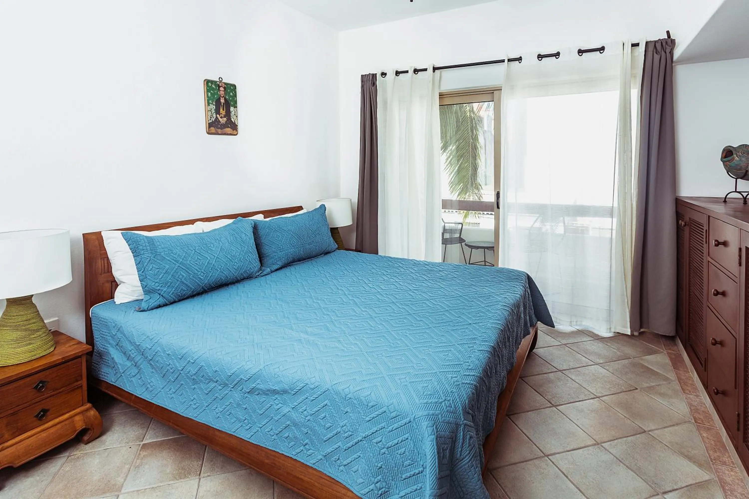 Bed in Fabiola Condo Hotel