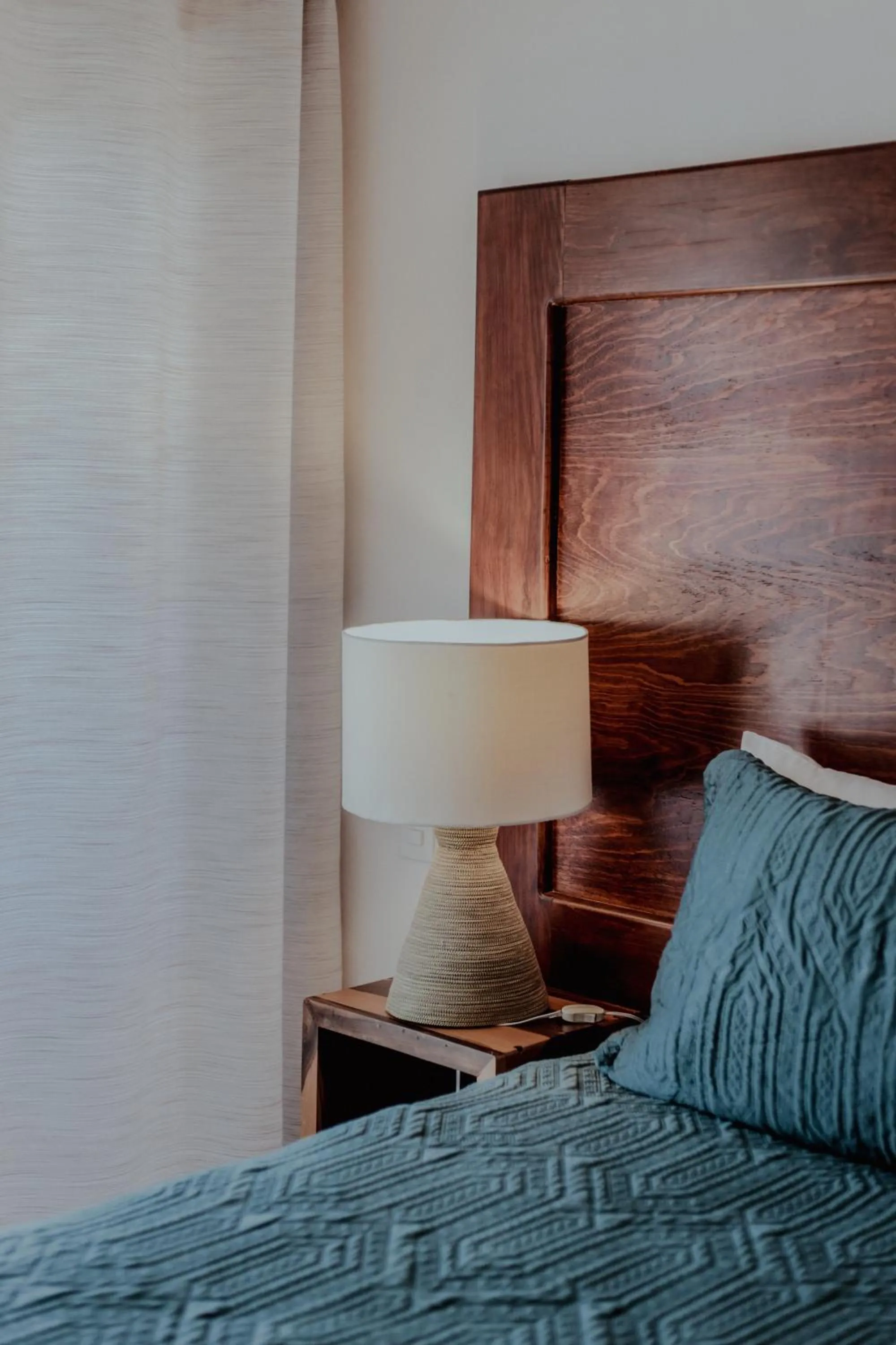 Bed in Fabiola Condo Hotel