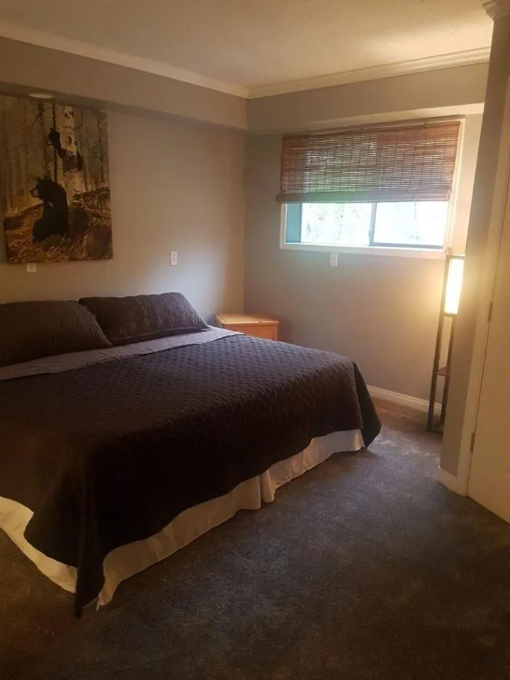 Bed in Riverbend Guest House