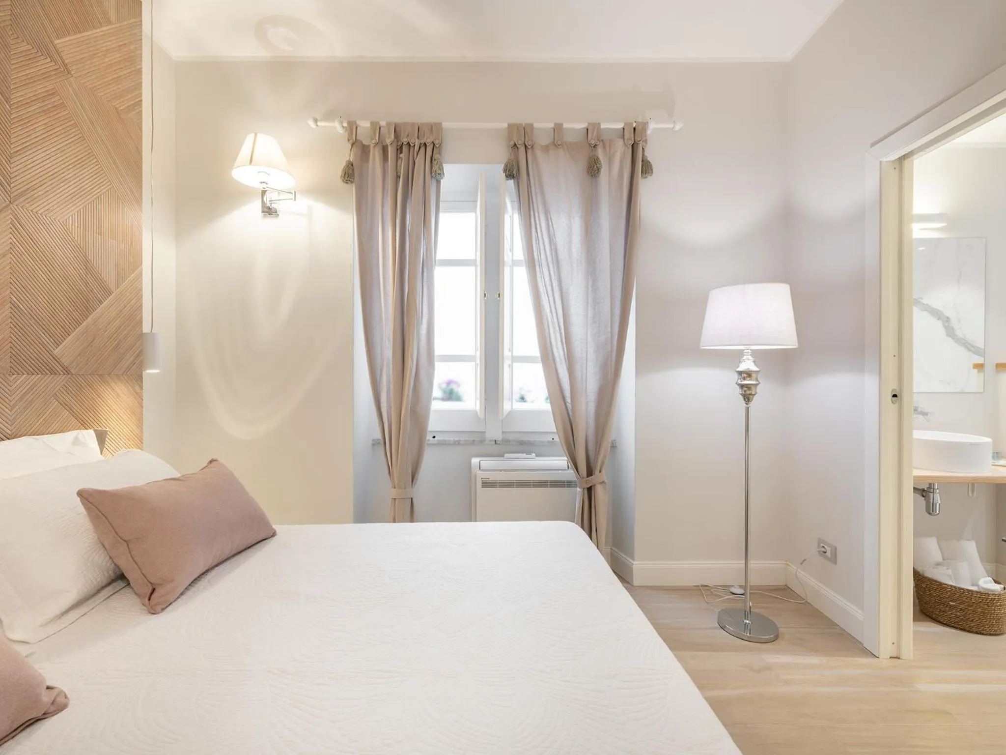 Bed in AQUAMADRE Suites