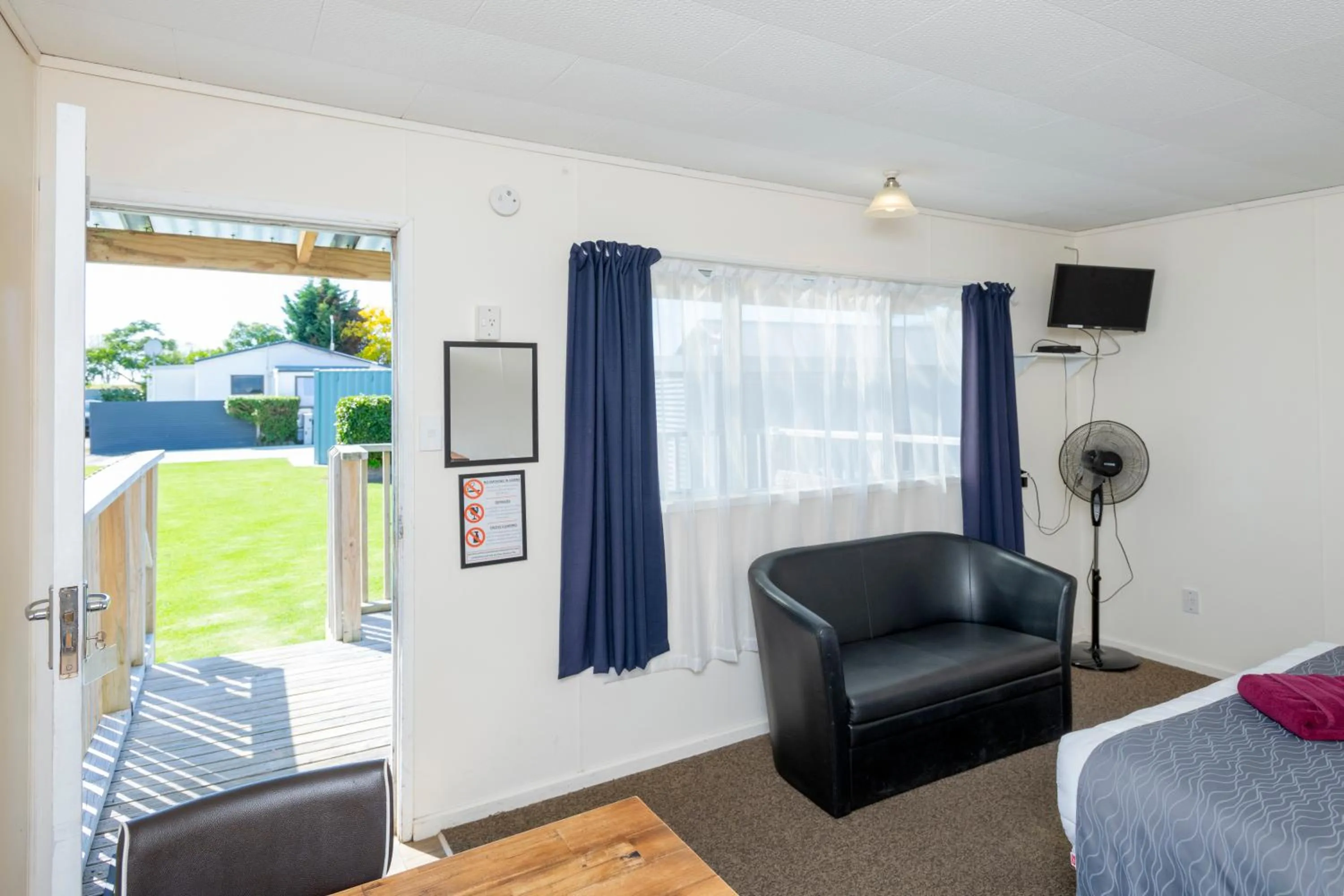 Seating area in Riverside Whakatane Holiday Park
