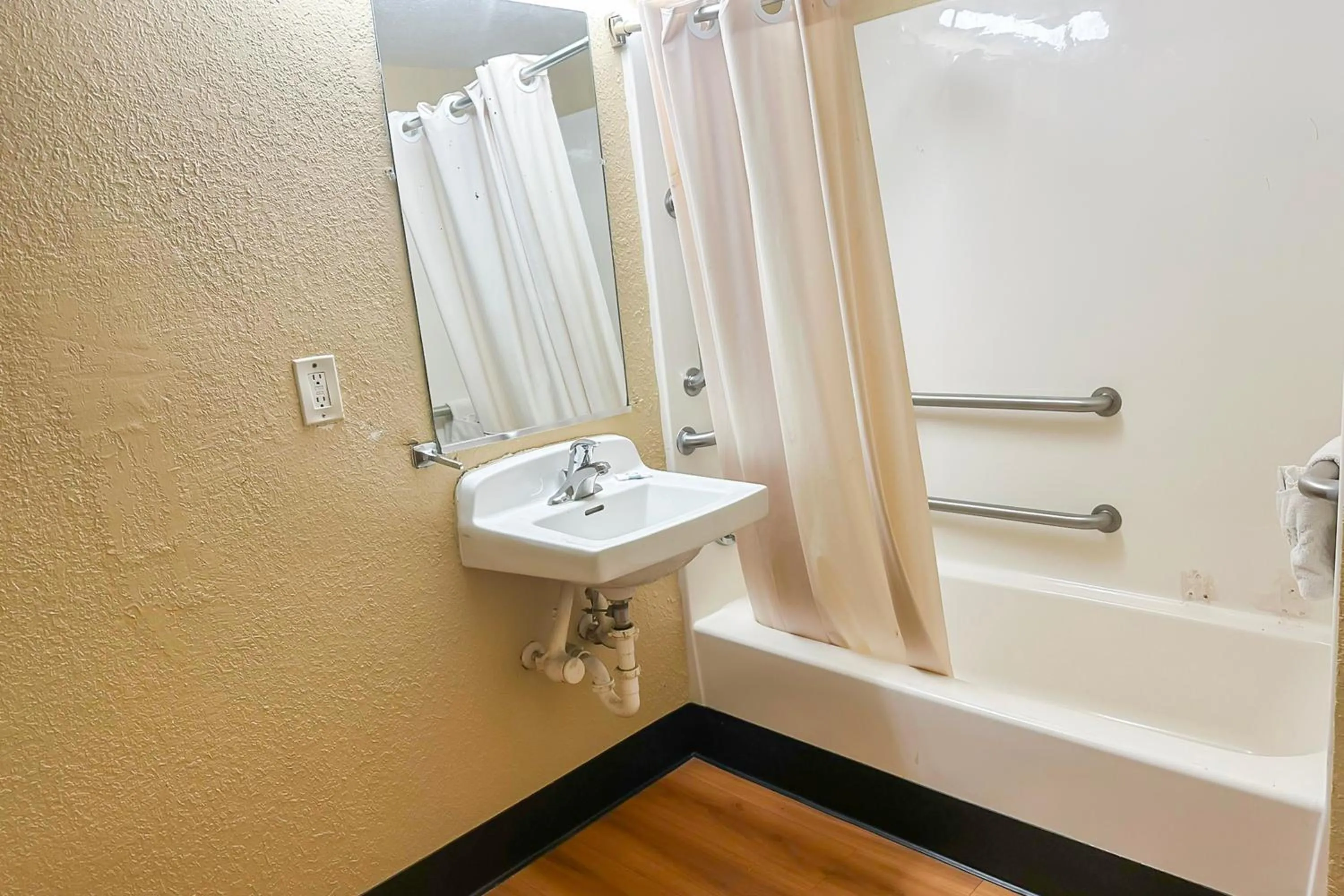 Bathroom in OYO Hotel Mobile, AL I-65 at Airport Blvd