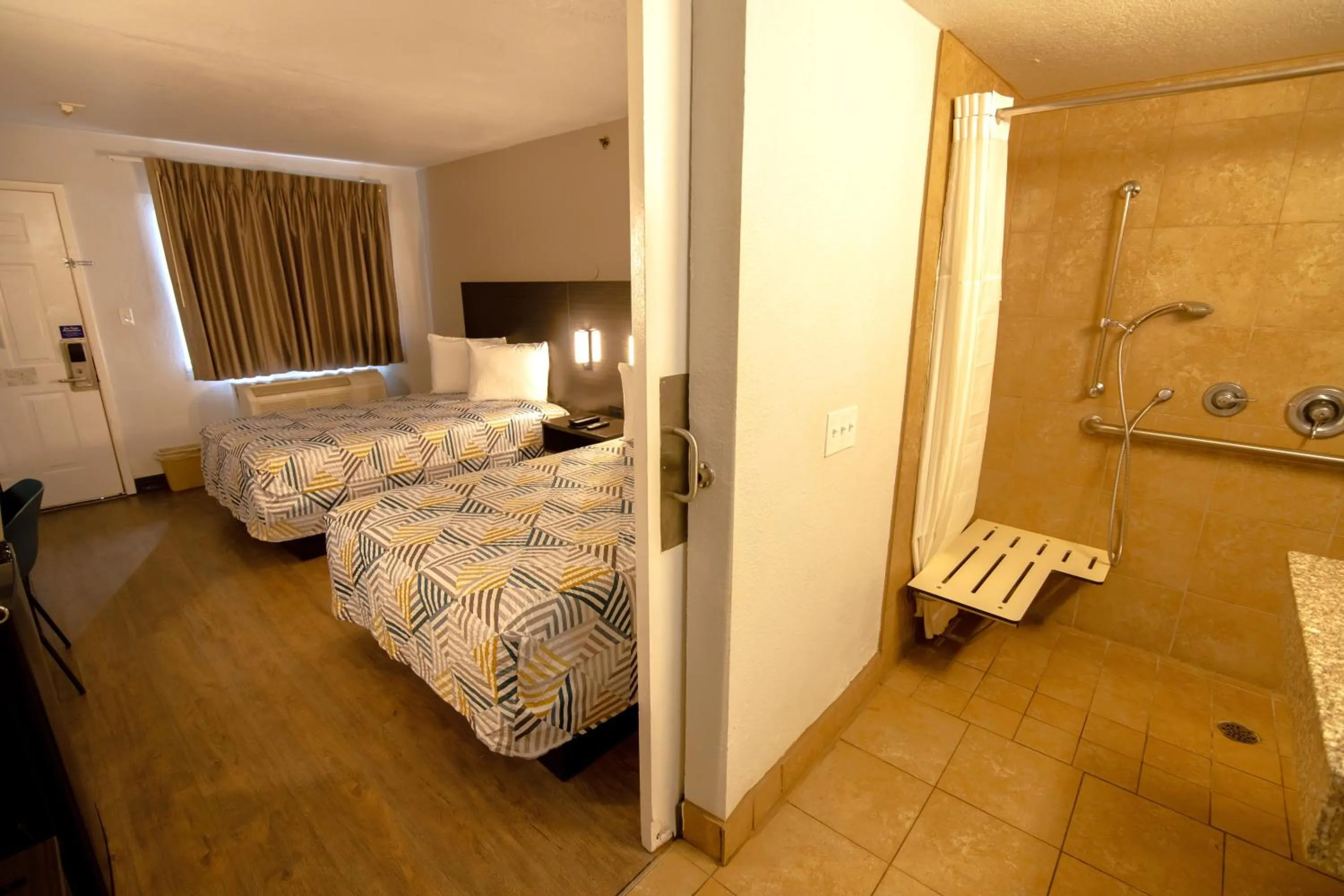 Photo of the whole room, Bed in Masters Inn Tucker