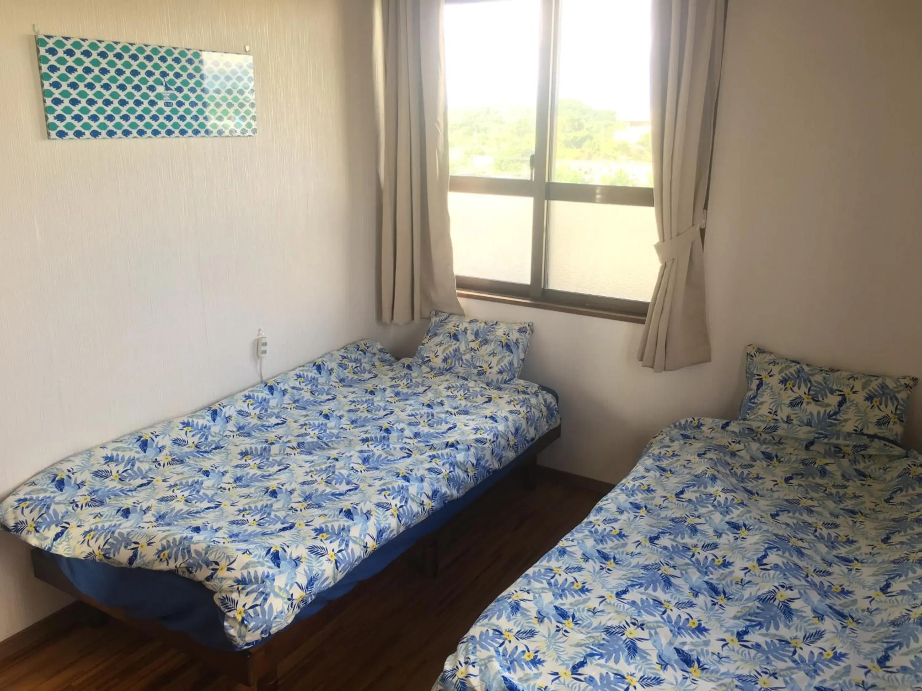 Twin Room with Shared Bathroom - single occupancy in Minnkayado intoparitosura Twin Room with Shared Bathroom - single occupancy in Minnkayado intoparitosura