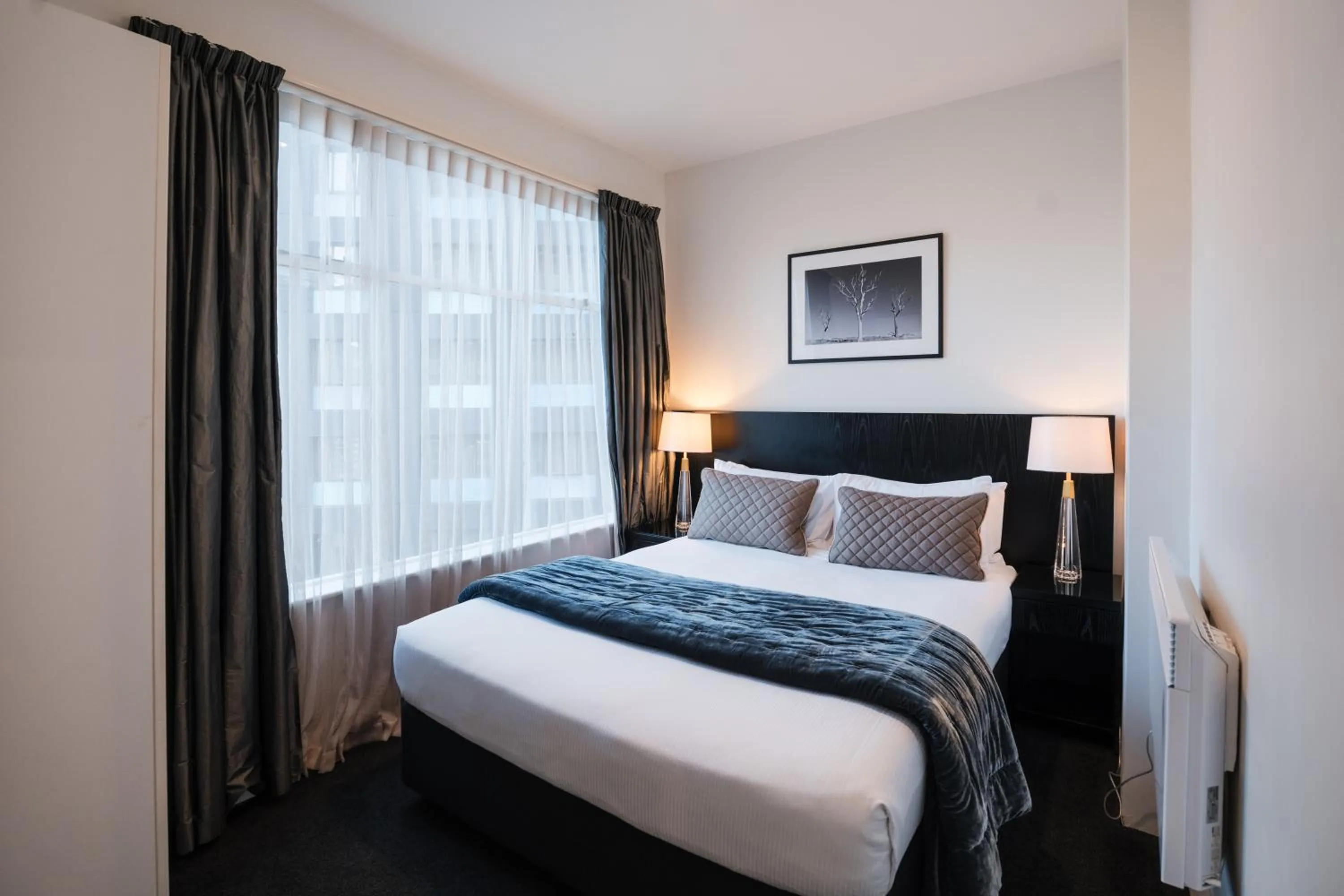 Bed in Gilmer Apartment Hotel