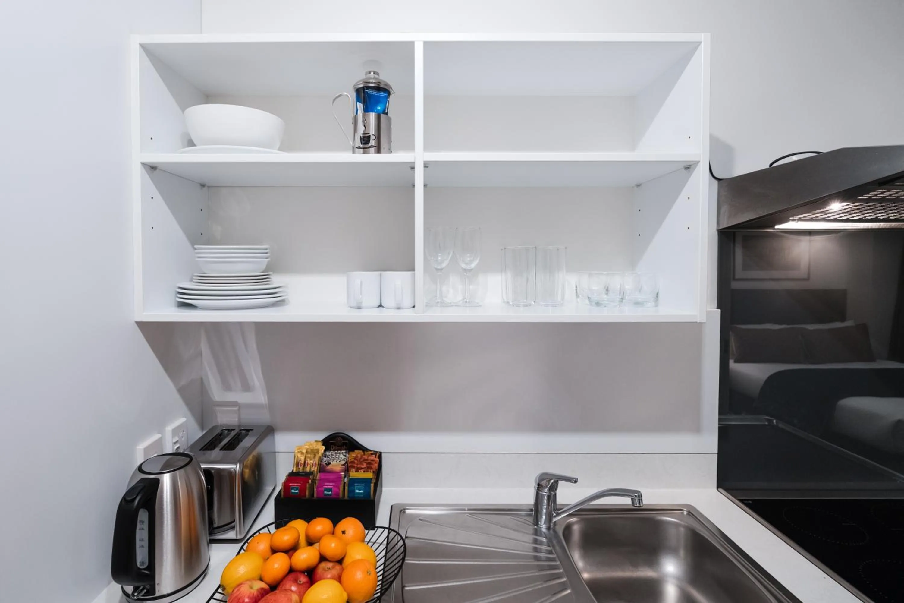 Kitchen or kitchenette in Gilmer Apartment Hotel