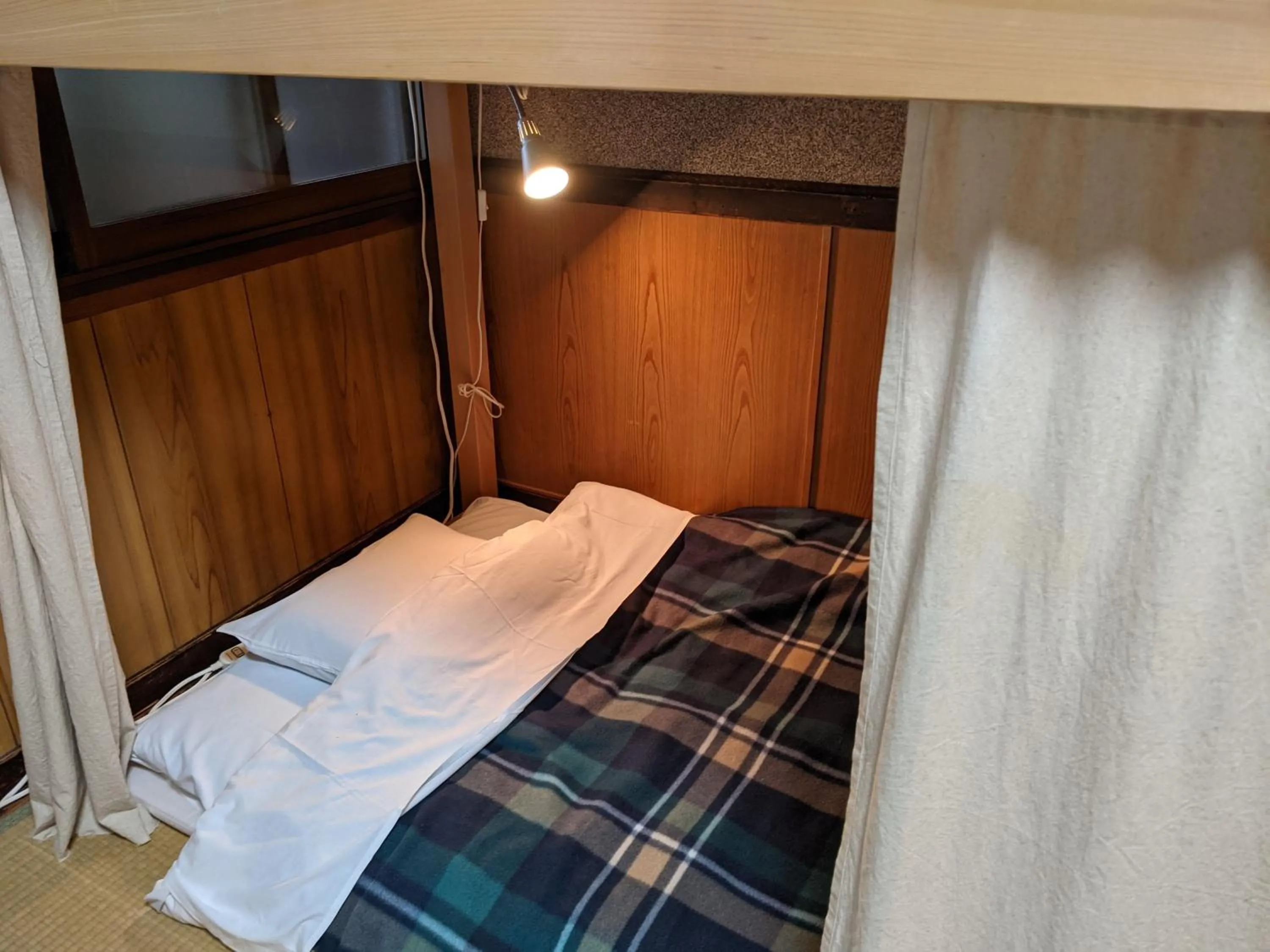 Bed in Guesthouse Tomaru