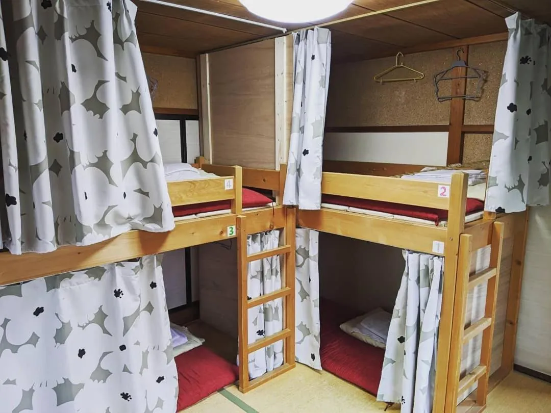 Bed in Guesthouse Tomaru