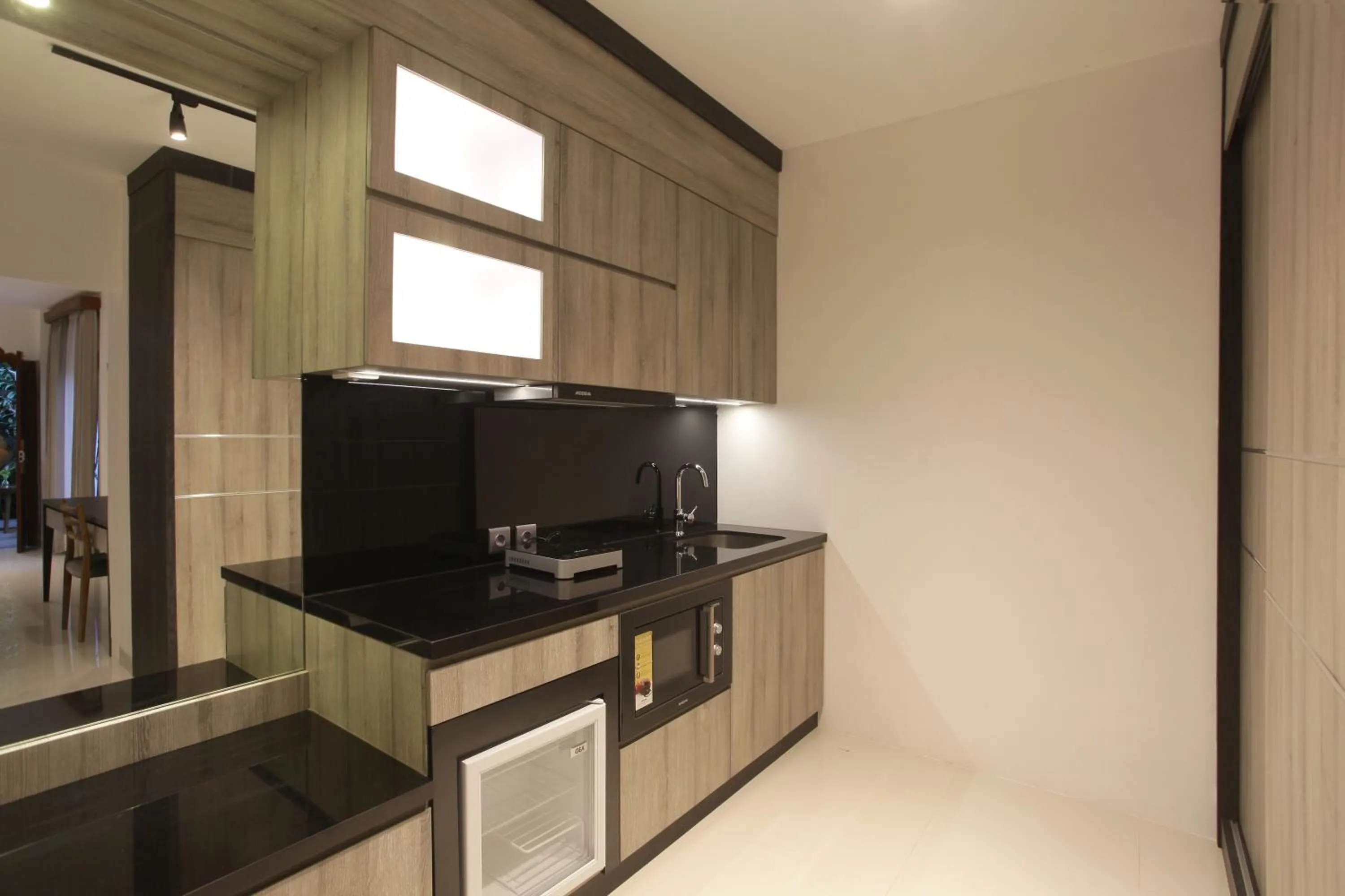 Kitchen or kitchenette in Matahari Bungalow