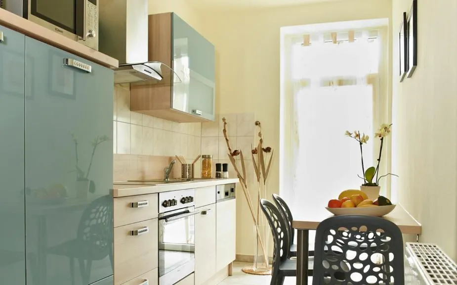 Kitchen or kitchenette in Auenwald Hotel und Apartmenthaus