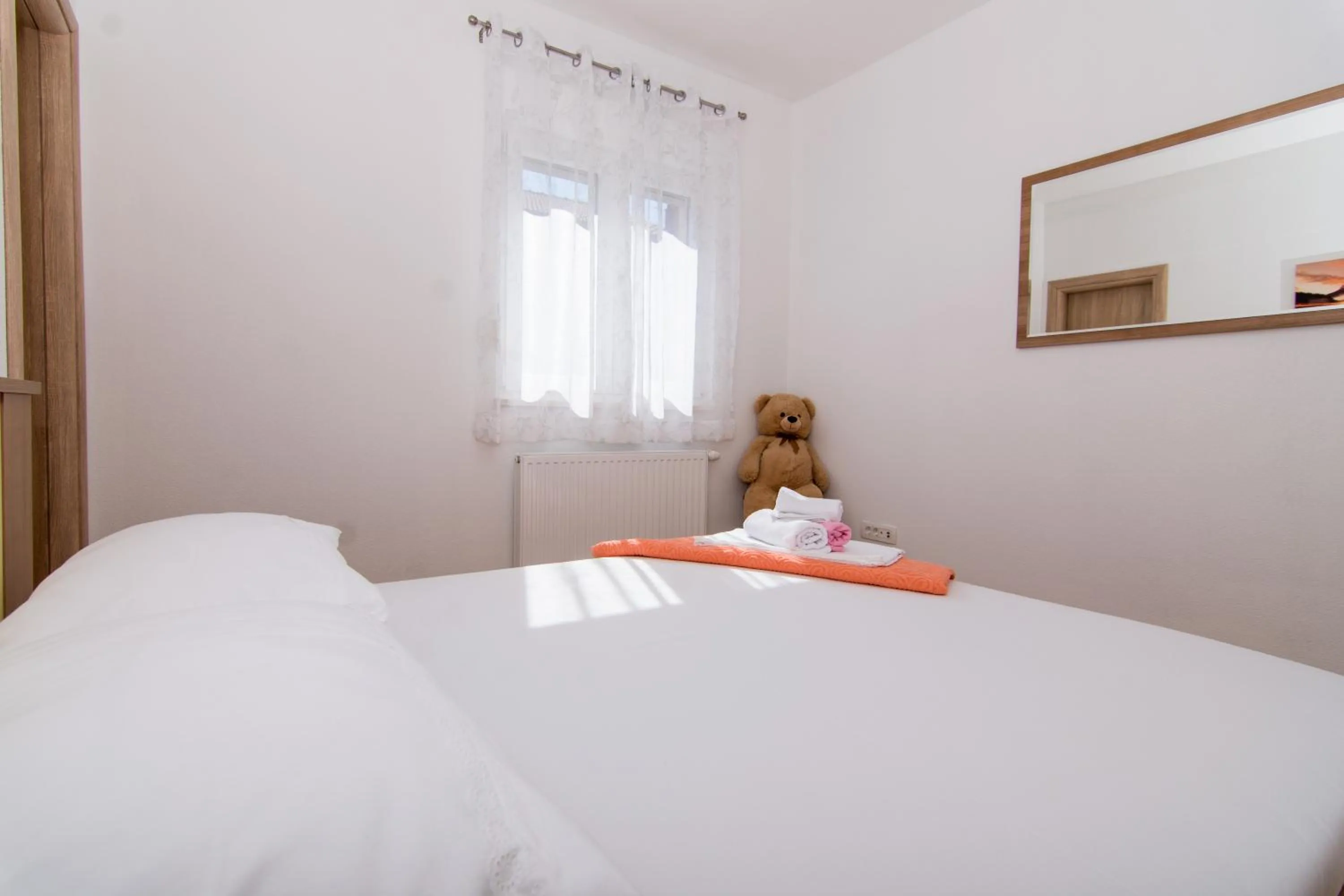 Bed in Apartments Ploka