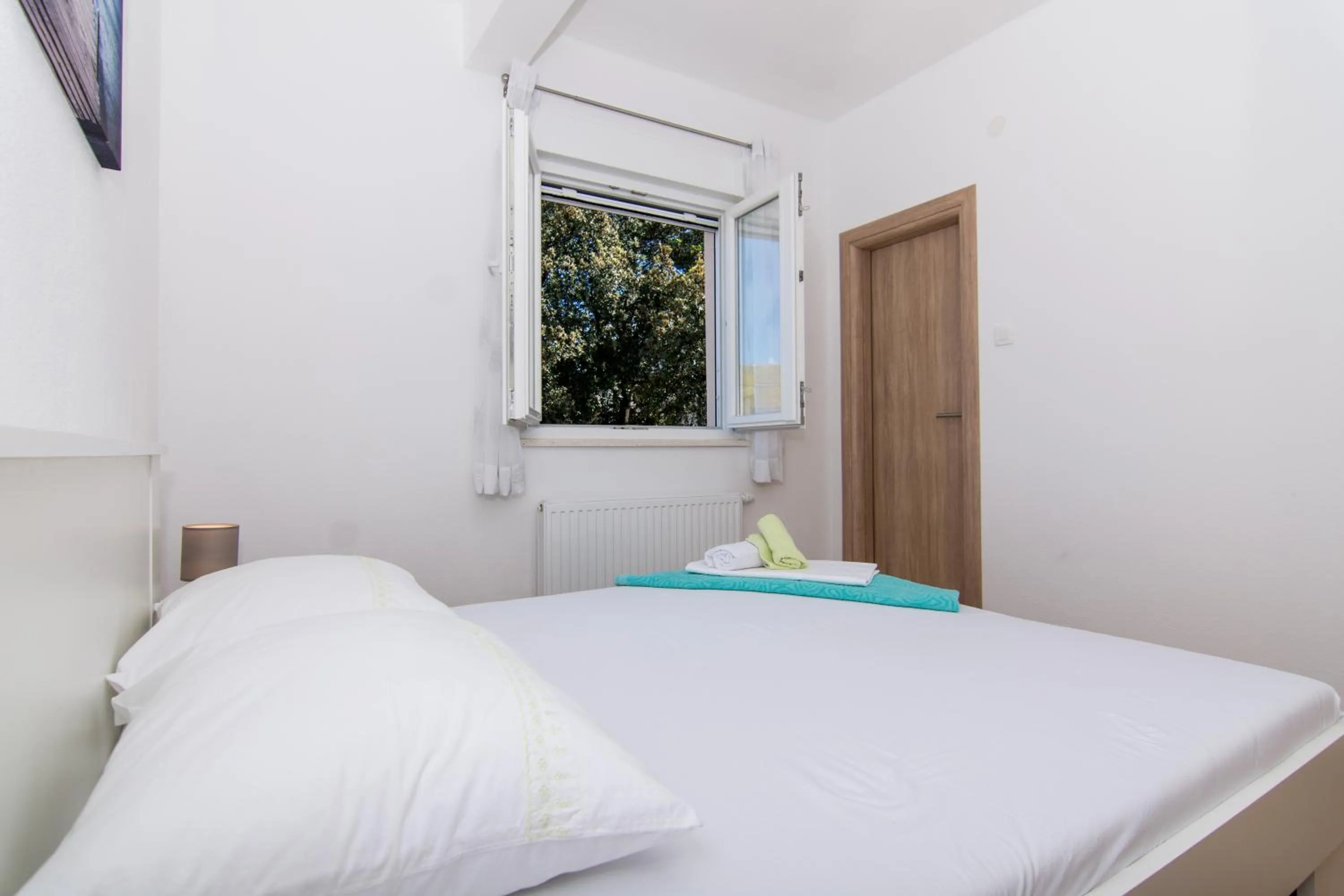 Bed in Apartments Ploka