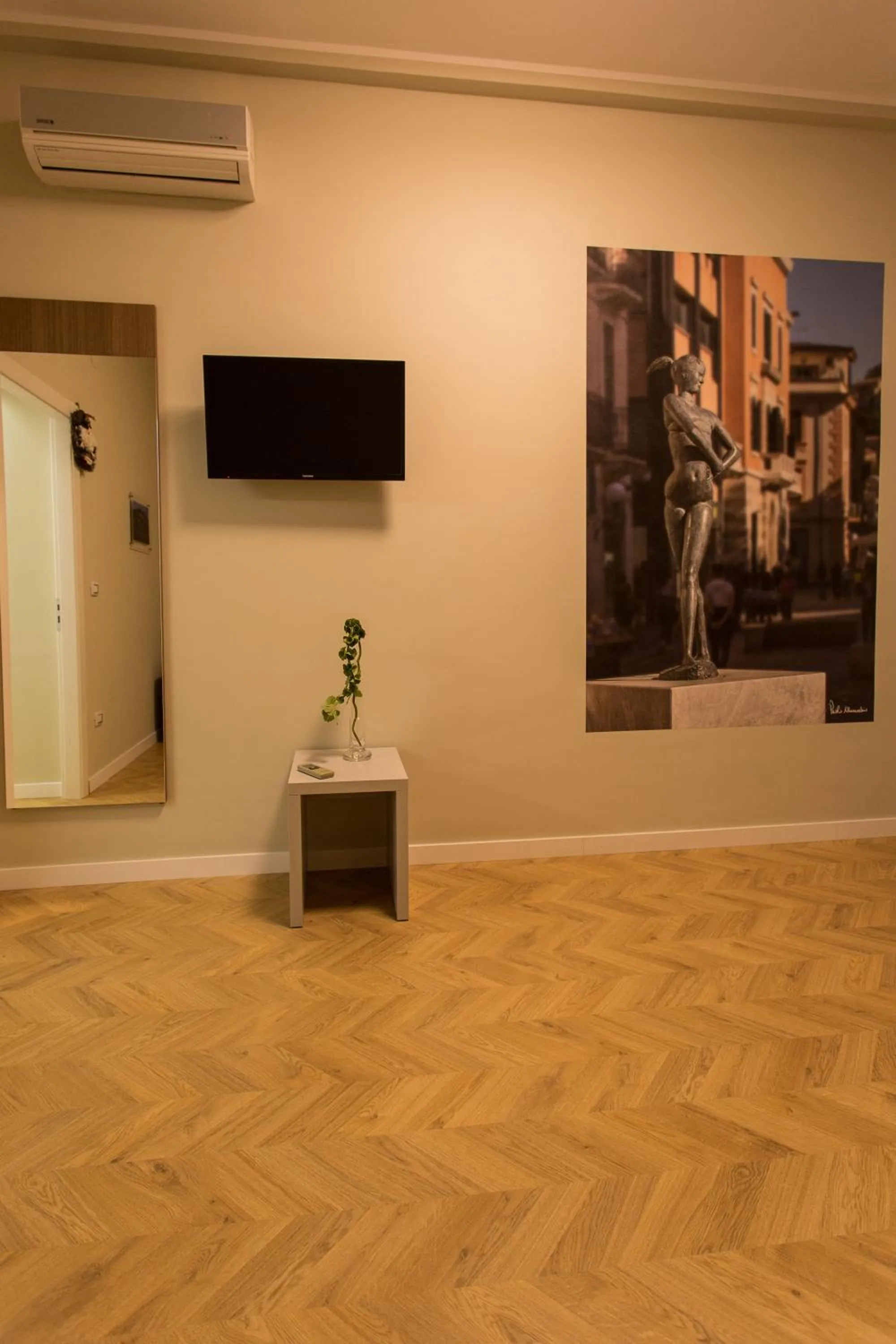 Communal lounge/ TV room in Le Affacciate Bruzie Home Guest House