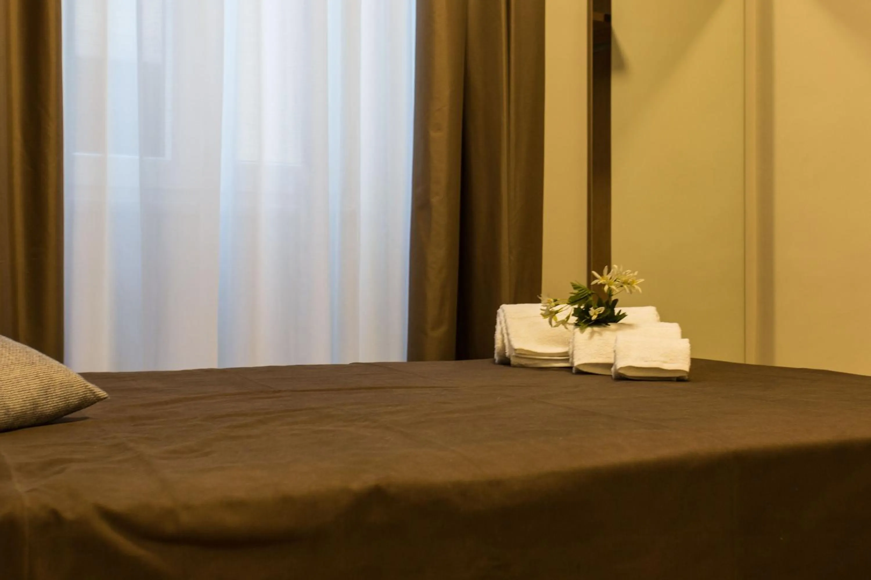 Bed in Le Affacciate Bruzie Home Guest House