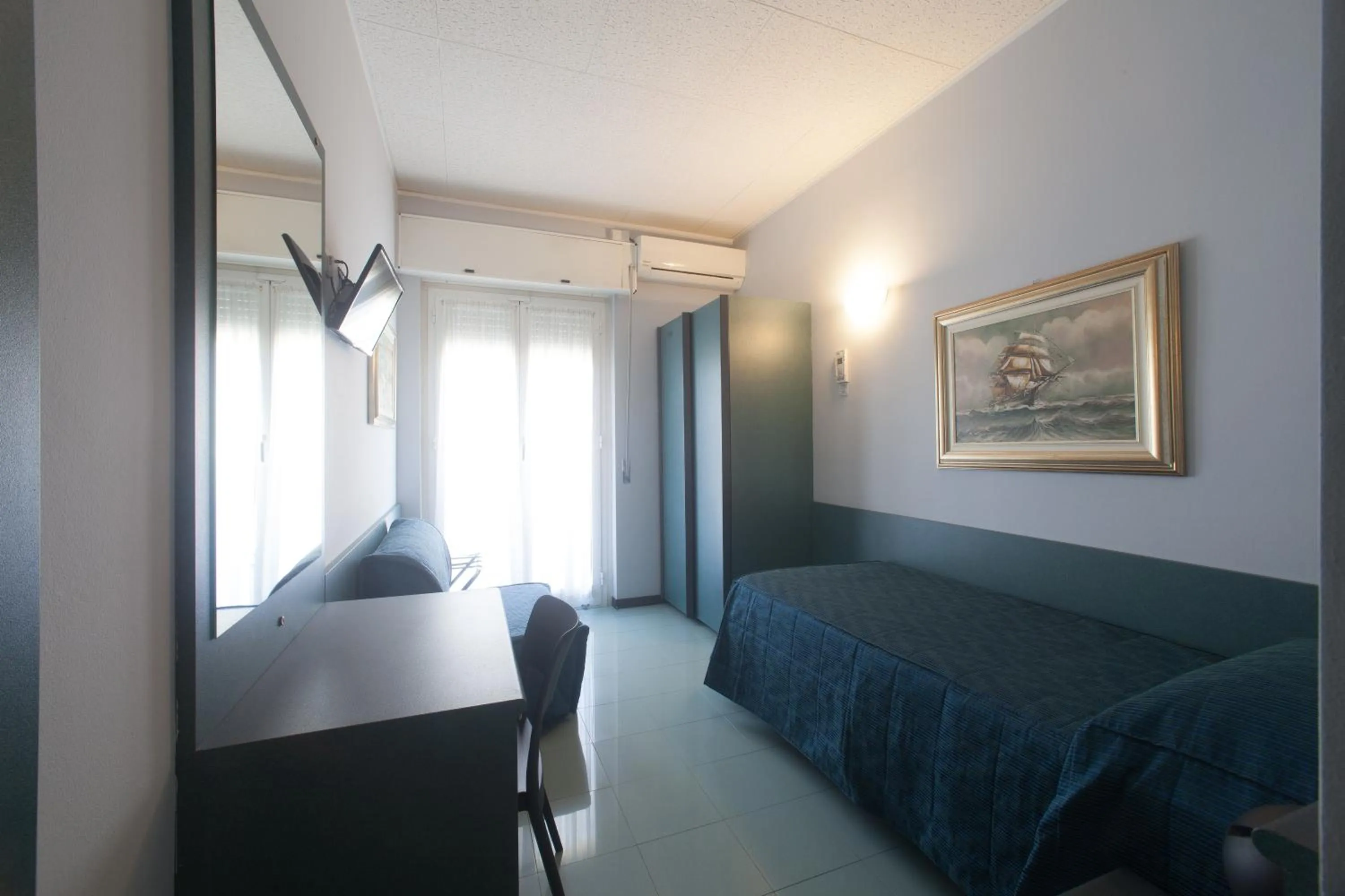 Bed in Hotel Tirreno