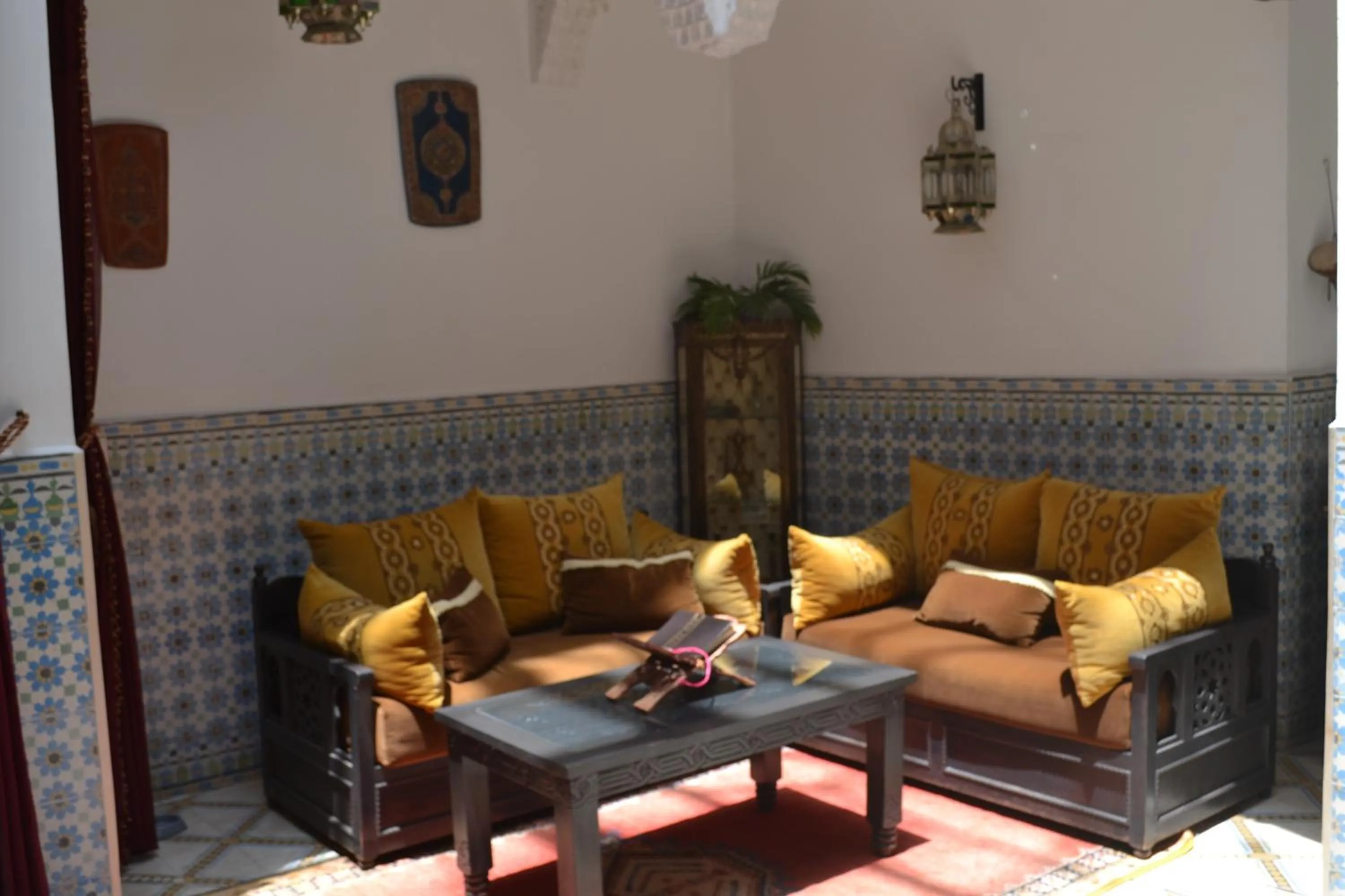 Communal lounge/ TV room in Riad Mouna