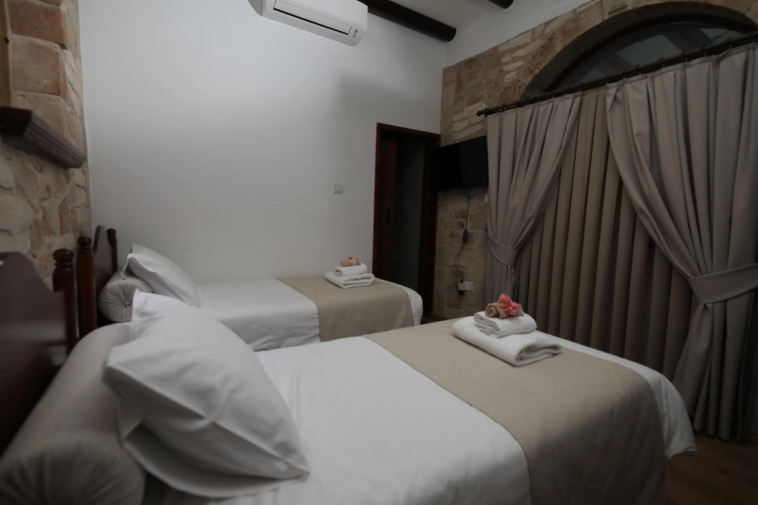 Bed in Hanna Koumi Boutique Hotel