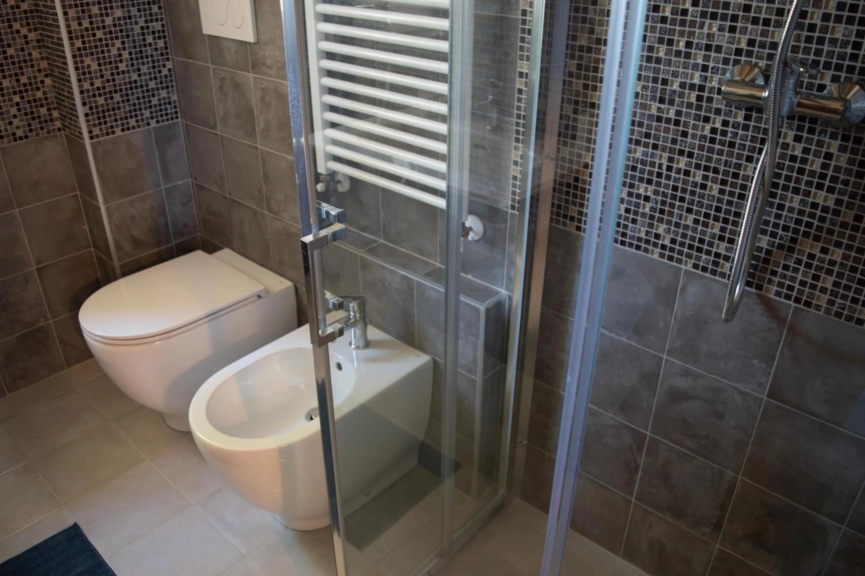 Communal lounge/ TV room in B&B Le Quattro Civette