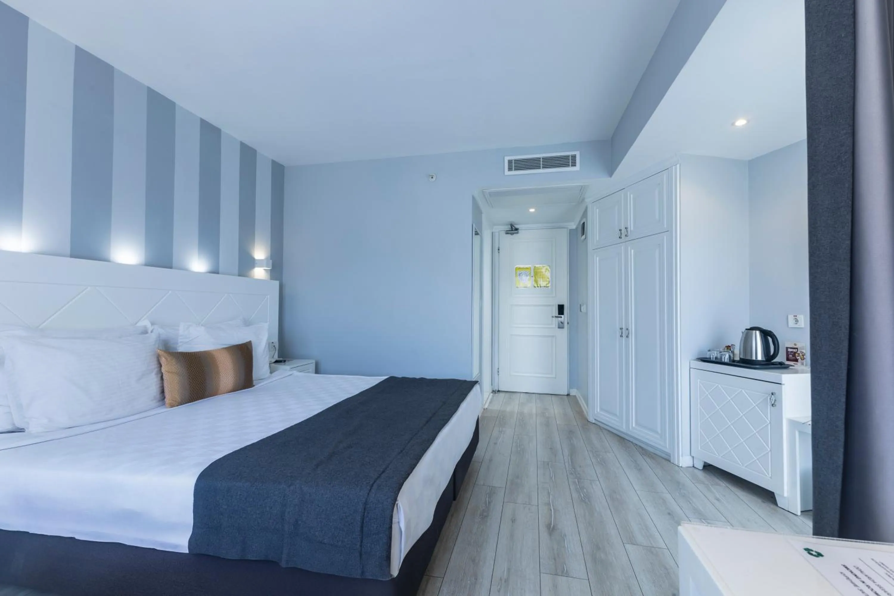 Bed in Motto Premium Hotel&Spa