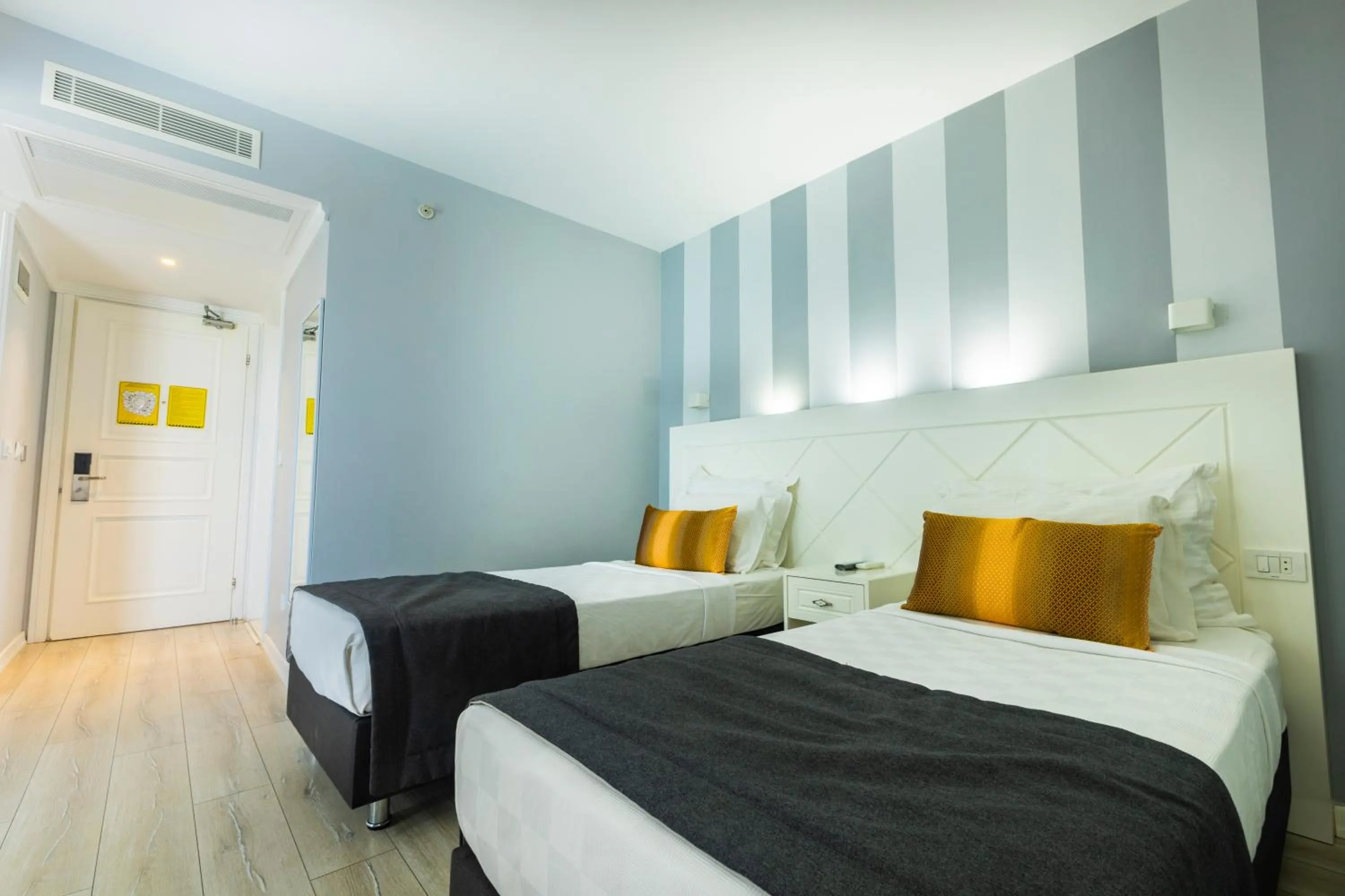 Bed in Motto Premium Hotel&Spa