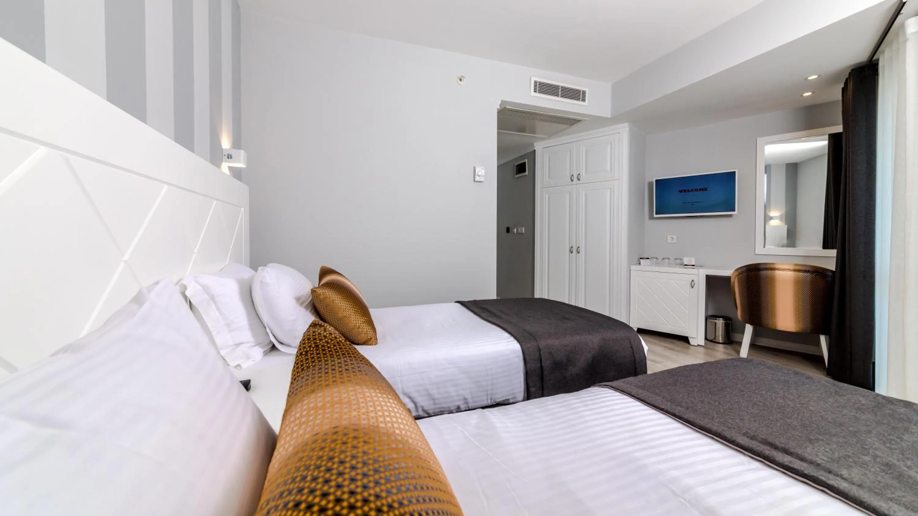 Bed in Motto Premium Hotel&Spa