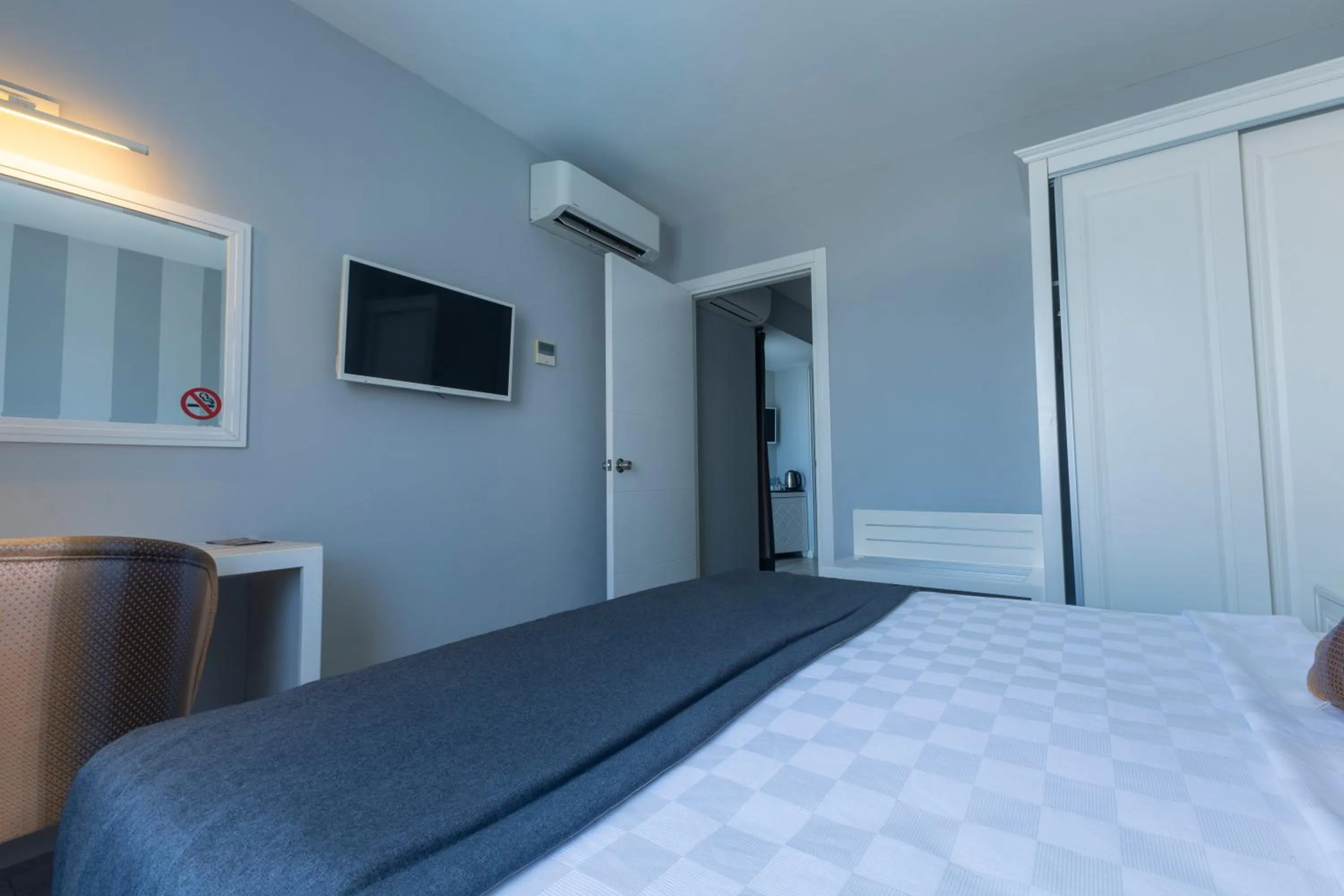 Bed in Motto Premium Hotel&Spa