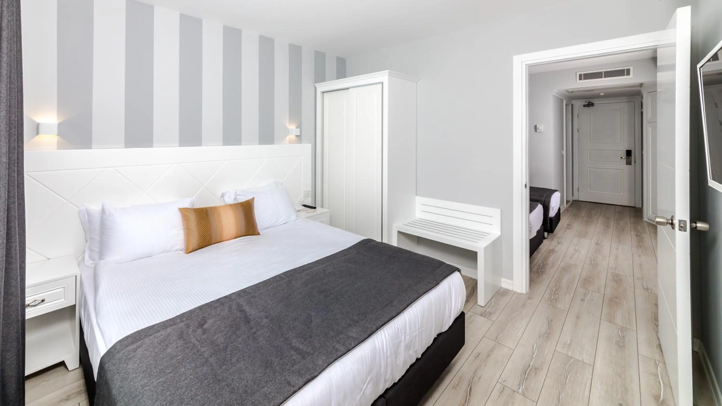 Bed in Motto Premium Hotel&Spa