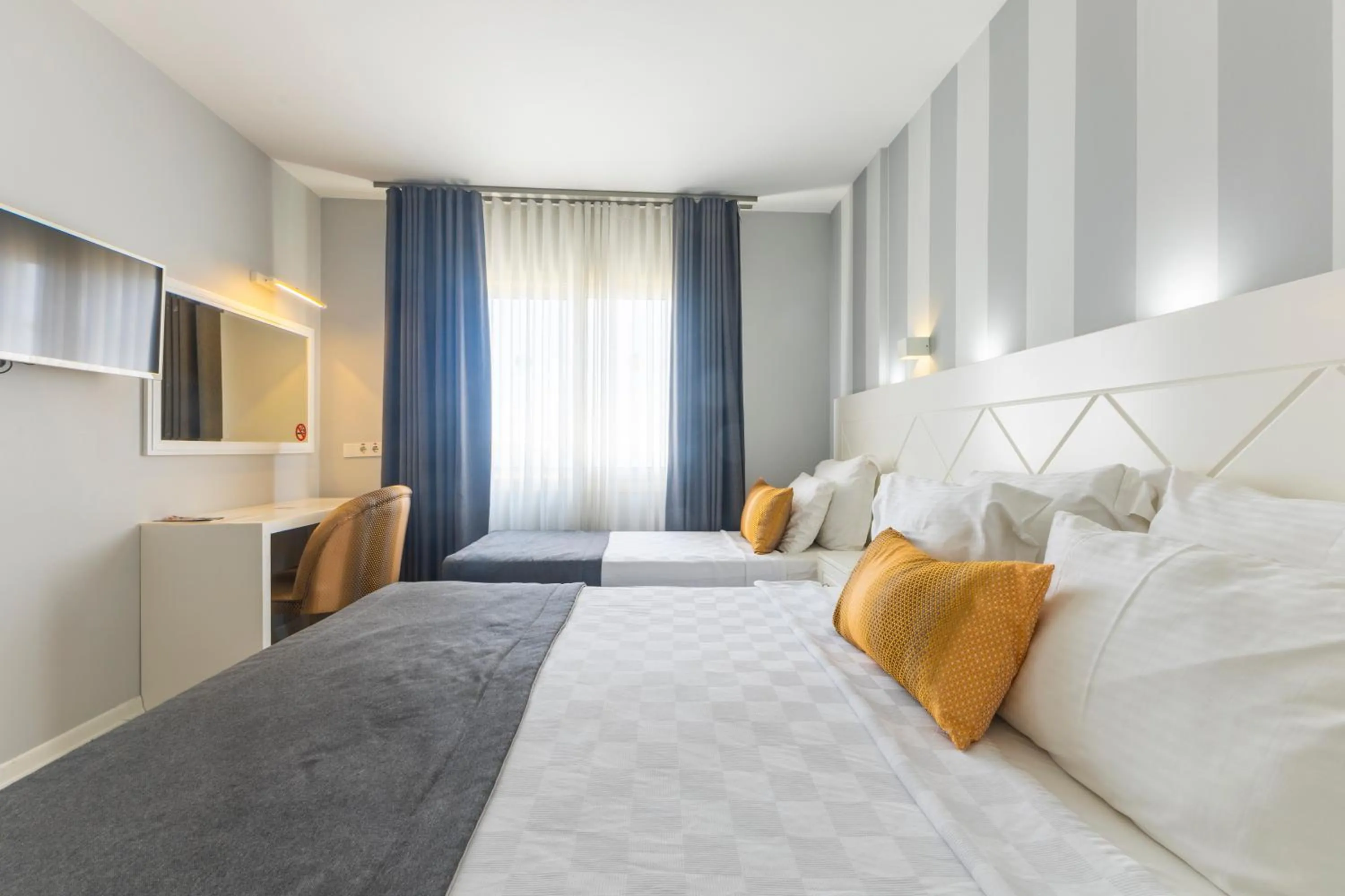 Bed in Motto Premium Hotel&Spa