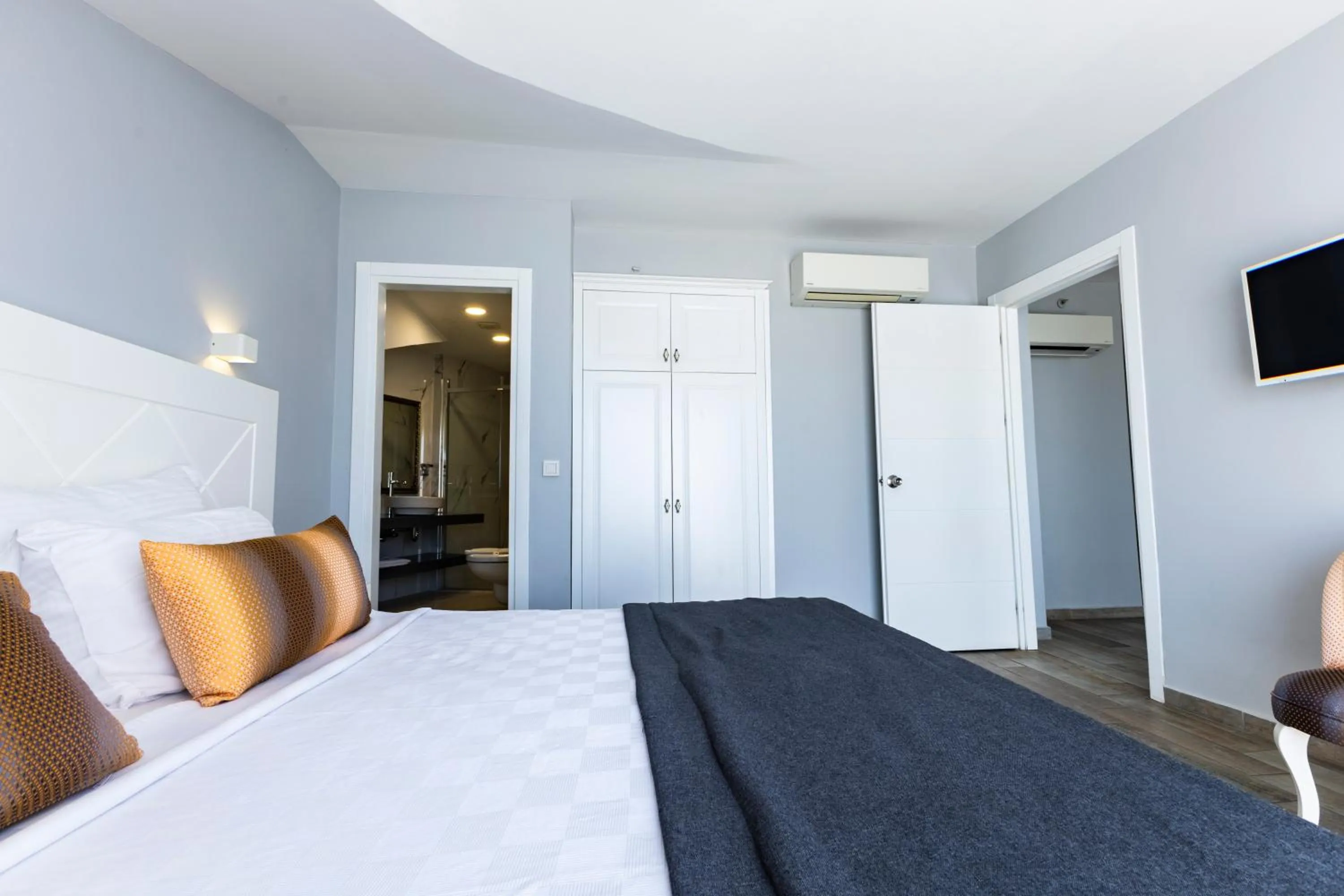 Bed in Motto Premium Hotel&Spa