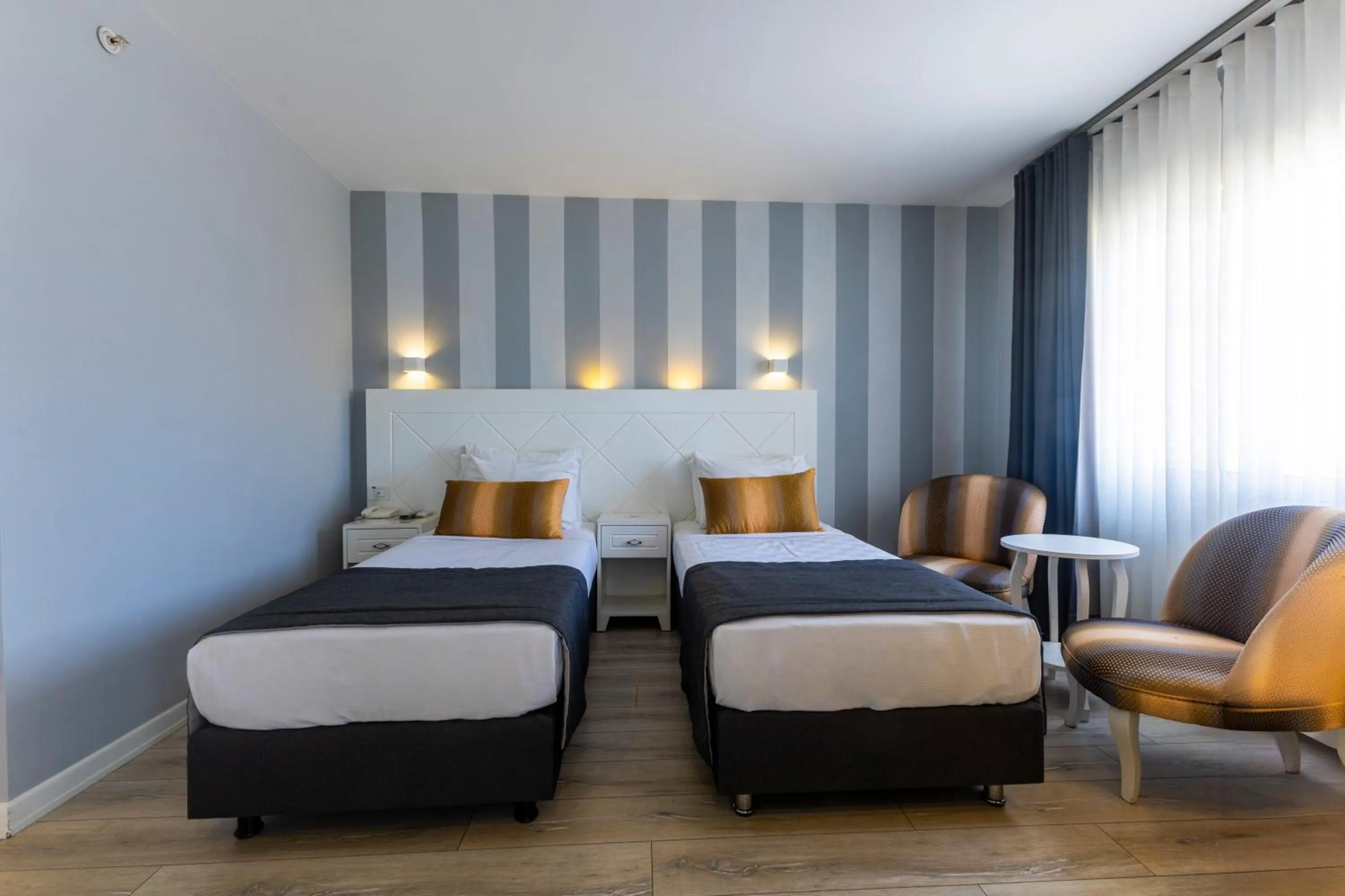 Bed in Motto Premium Hotel&Spa