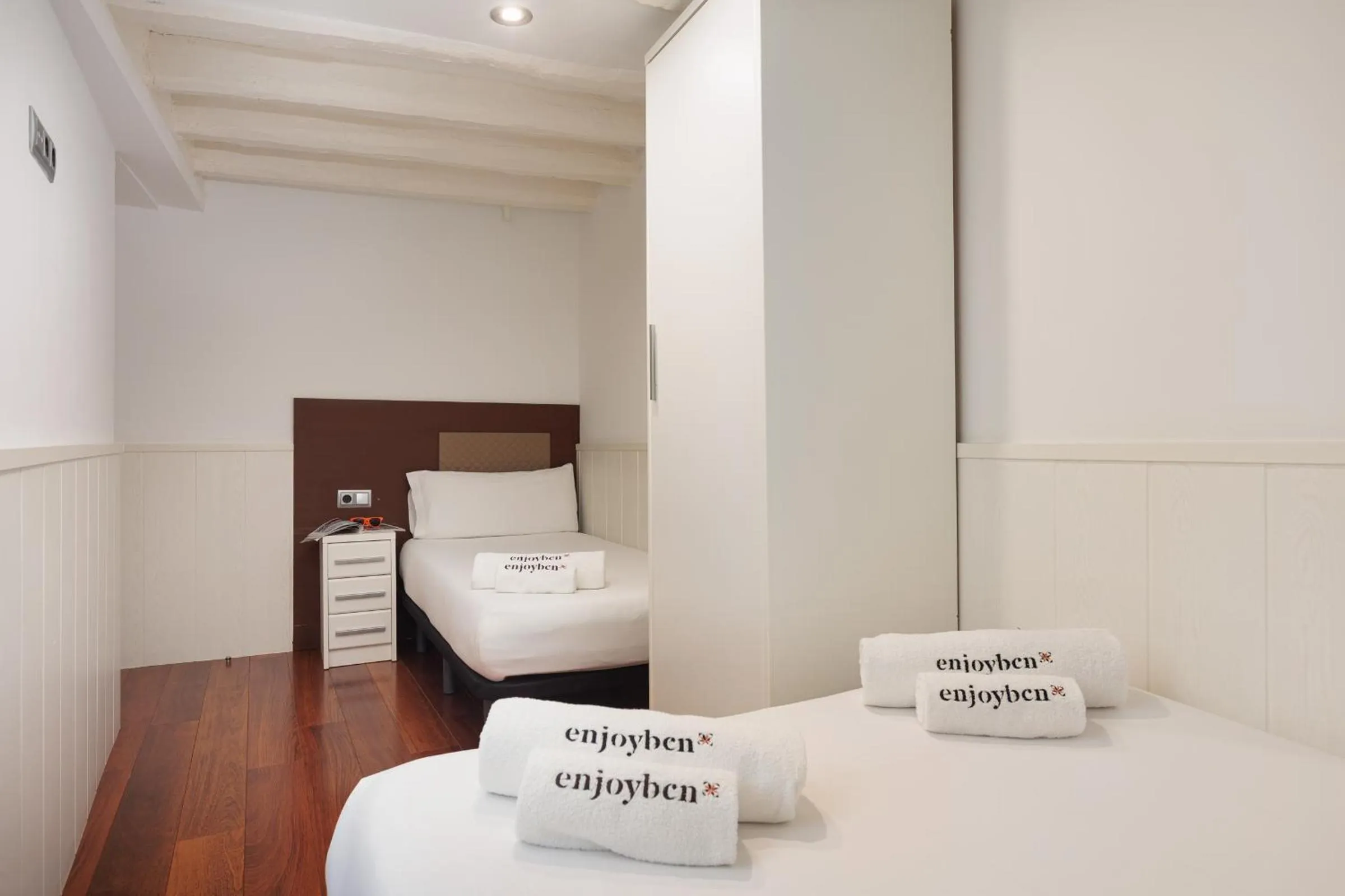 Bed in Enjoybcn Dali Apartments